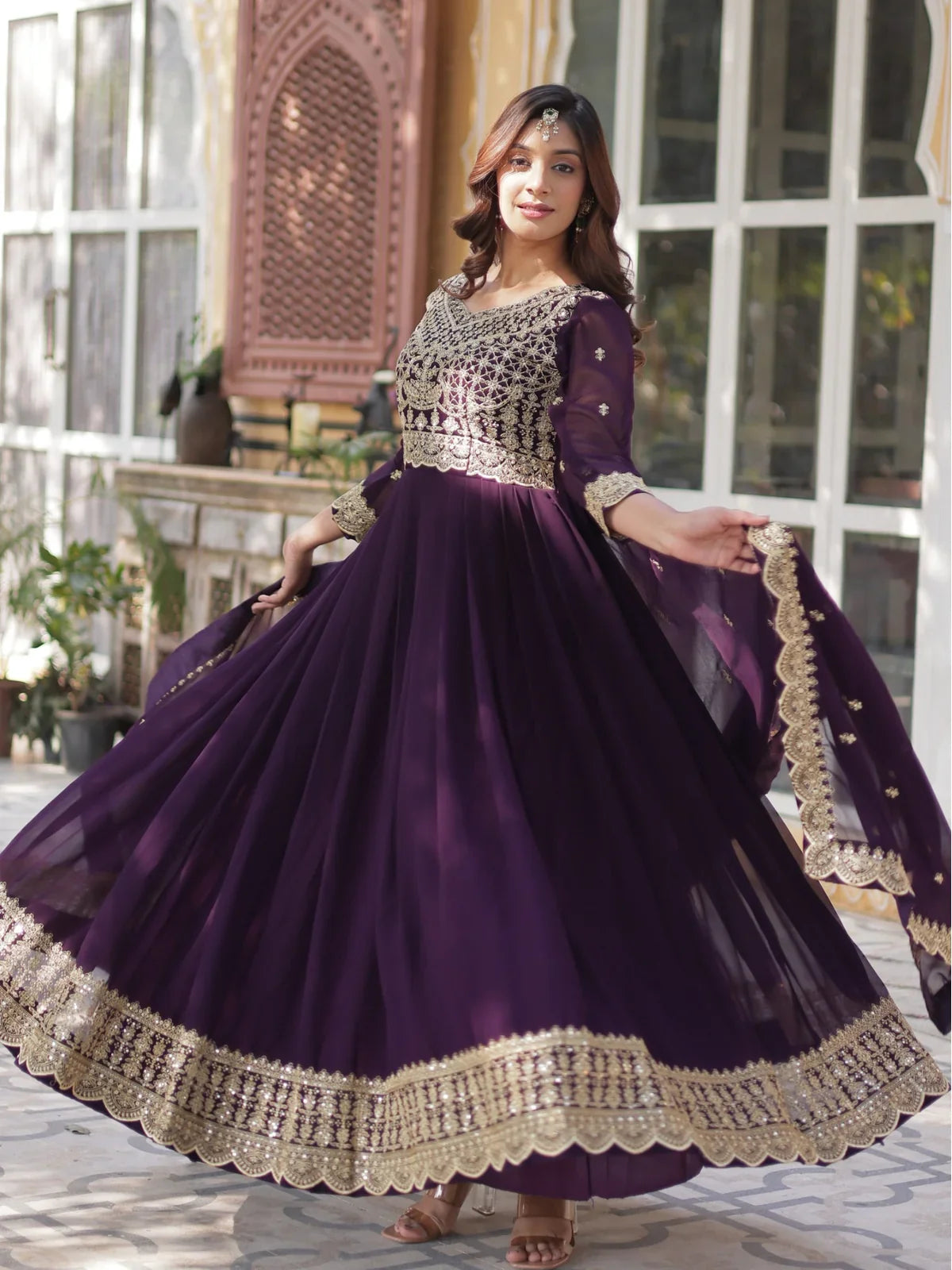 Tarani party wear faux blooming purple gown front twirl view with dupatta