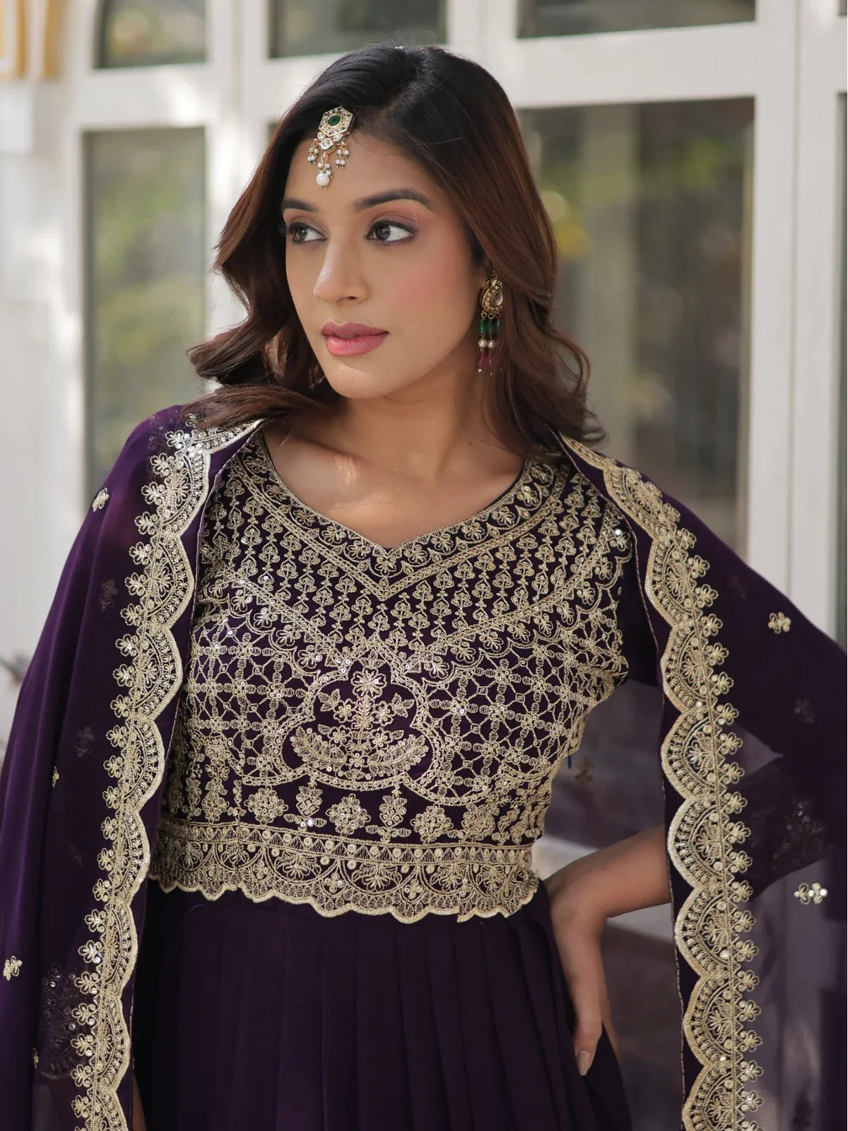 Tarani embroidered faux blooming purple gown upper body closeup with neckline detailing