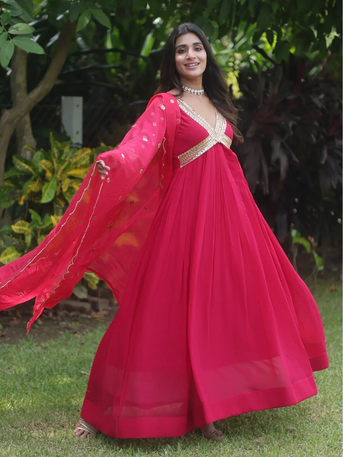 Tarani red faux blooming gown front view with flared design and elegant dupatta drape