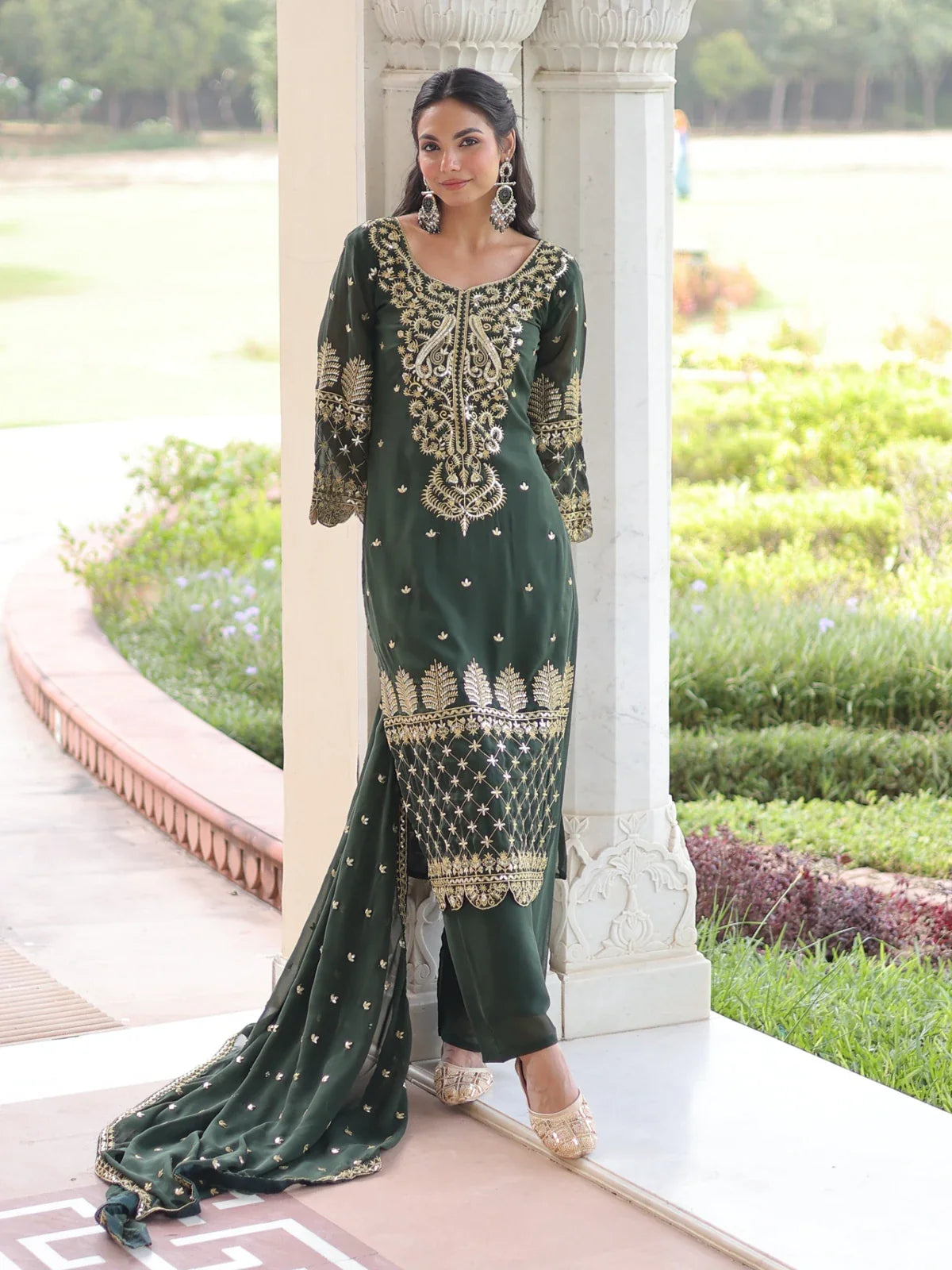 Tarani green faux blooming dress with full embroidery, pant and dupatta, ideal for weddings and festive events