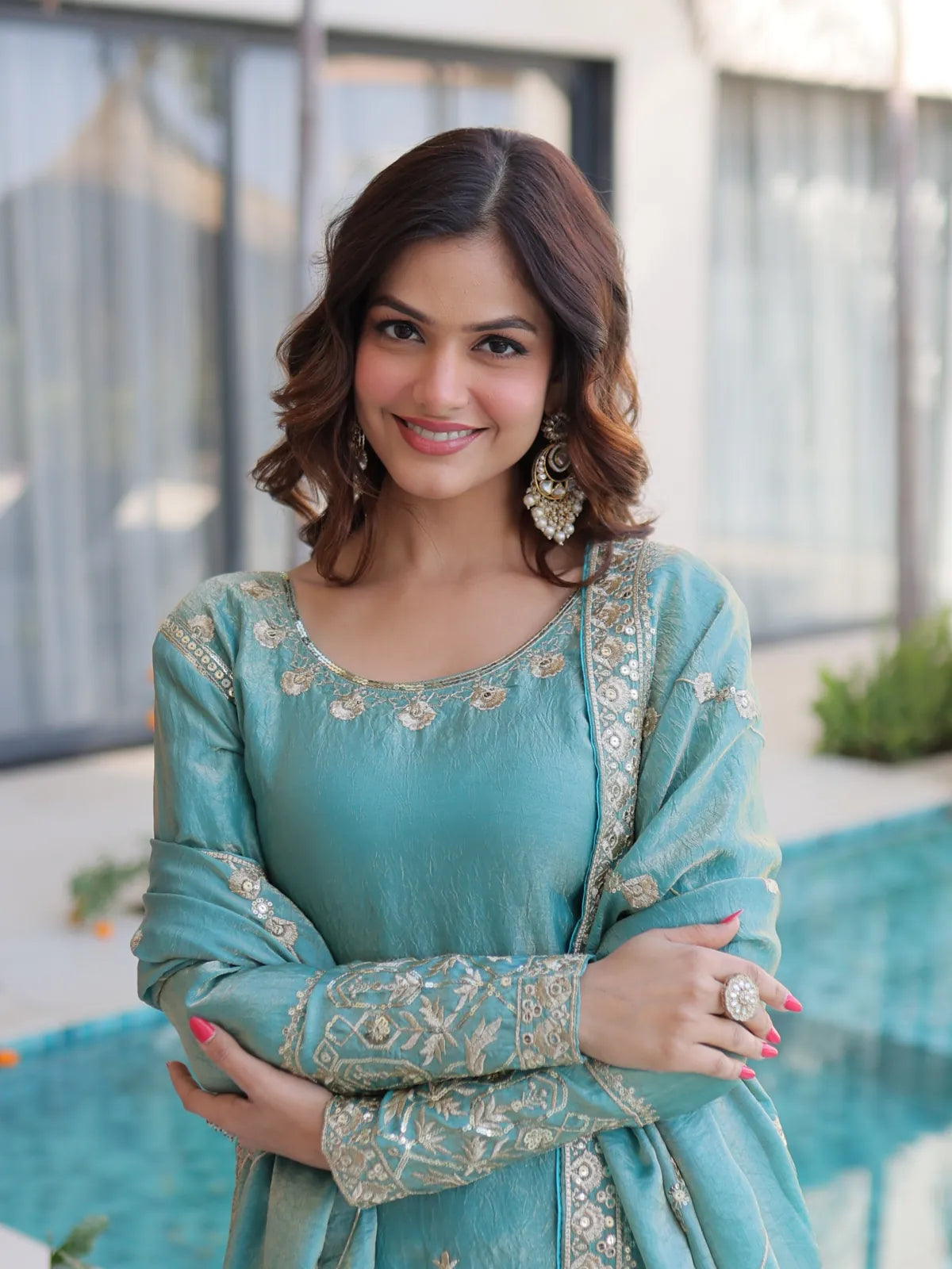 Tarani green Fendi dress close-up with zari and sequin embroidery in upper body view worn by Shwetita