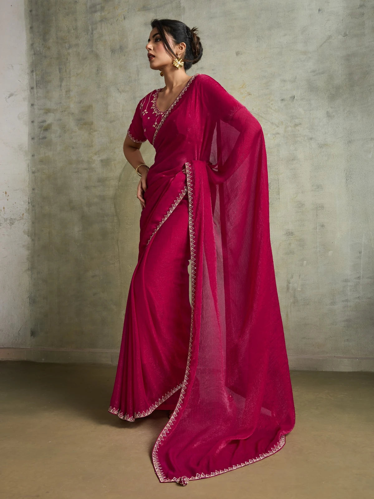 Tarani magenta designer chiffon saree side pose showing elegant pallu and border work