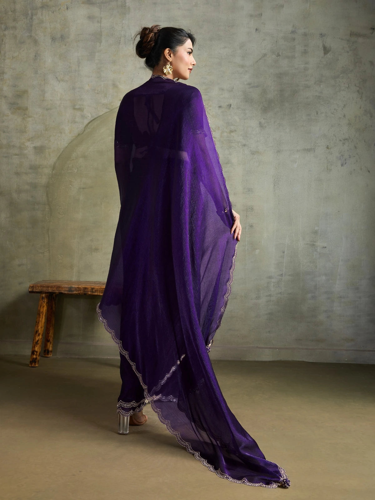 Tarani purple Fendy Chiffon saree back view with attached latkan and designer border