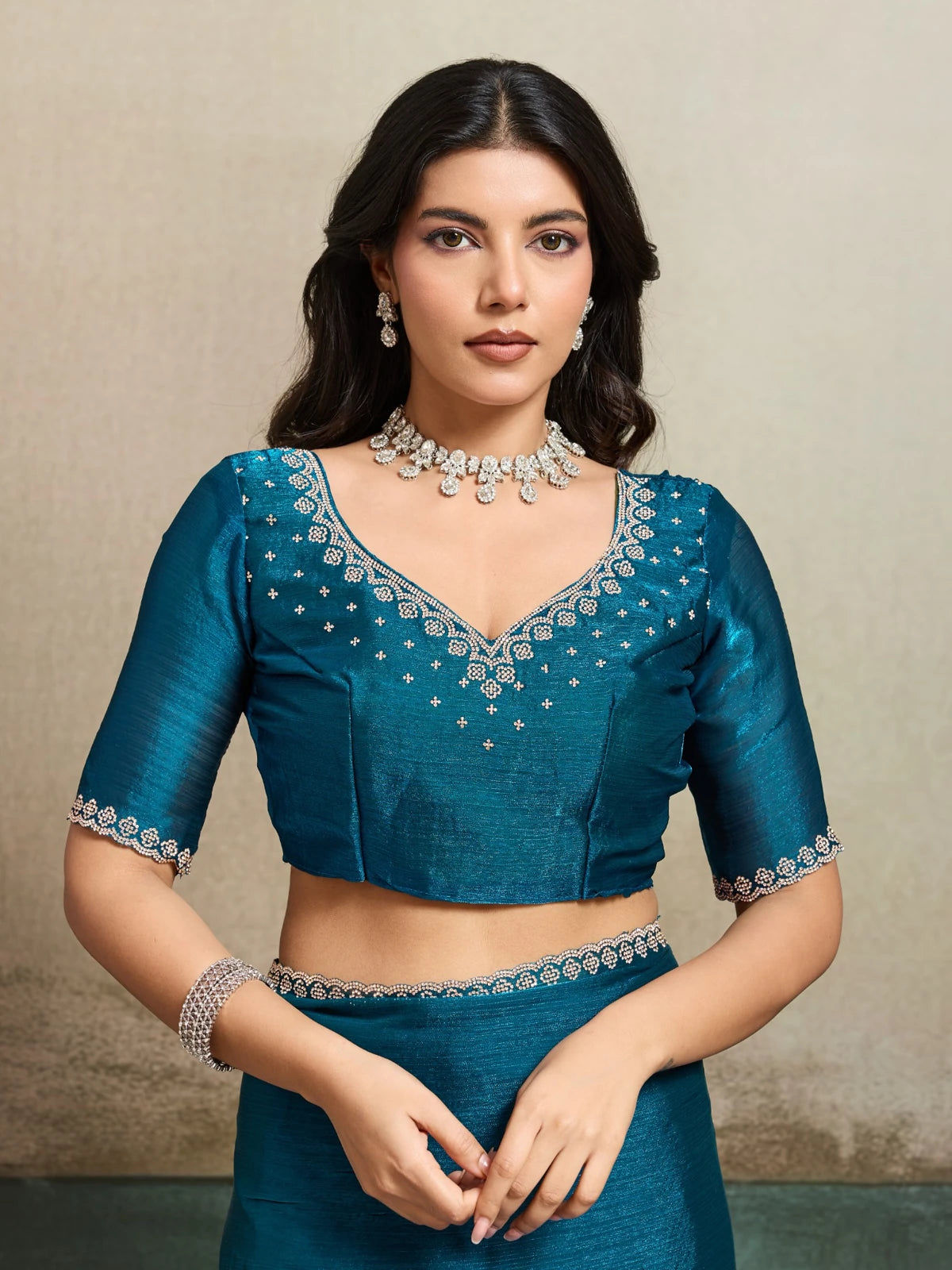 Tarani teal Fendy Chiffon blooming saree with Jarque work upper body view Neharika