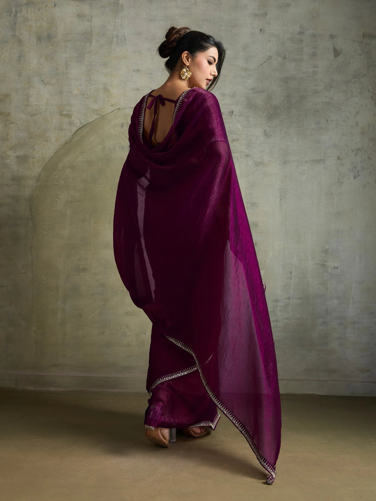 Tarani wine chiffon saree back view with graceful drape and embellished blouse design
