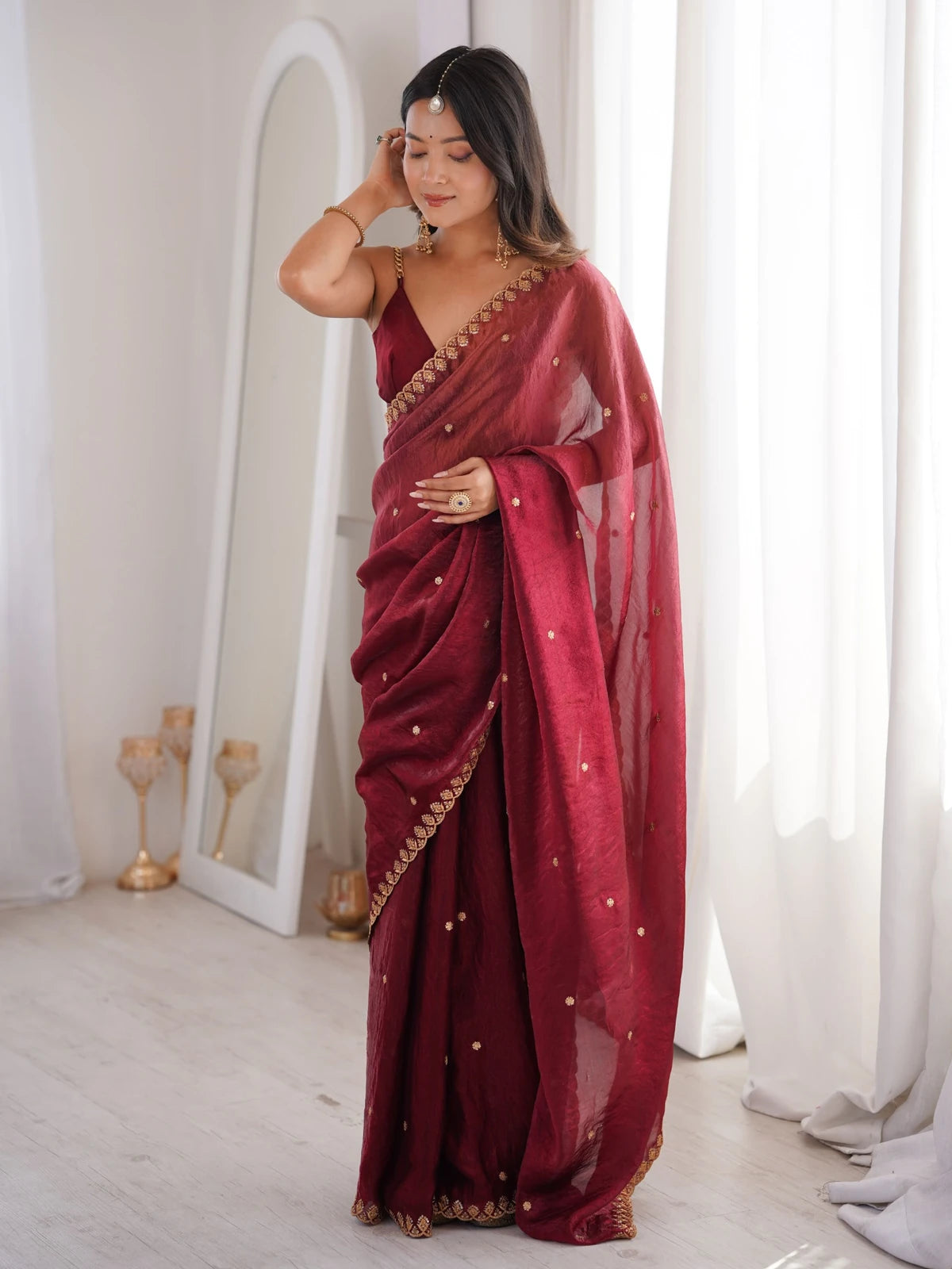 Tarani maroon Fendy Satin saree front pose with elegant sequence embroidery detailing