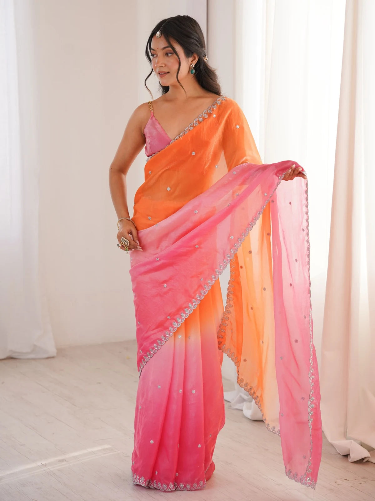 Tarani Umaira Fendy Satin saree showcasing embroidered pallu and border detailing