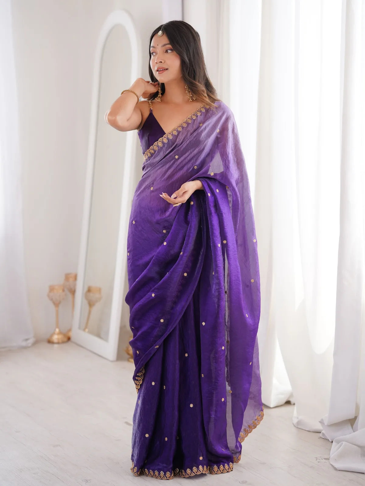 Tarani Suchita purple Fendy Satin saree elegant full length pose with matching blouse piece