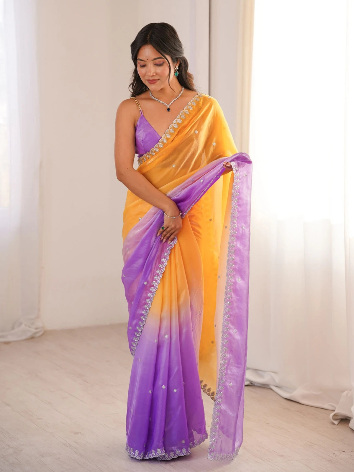 Tarani Divyashri yellow Fendy Satin saree with purple ombre pallu and sequence embroidery full view