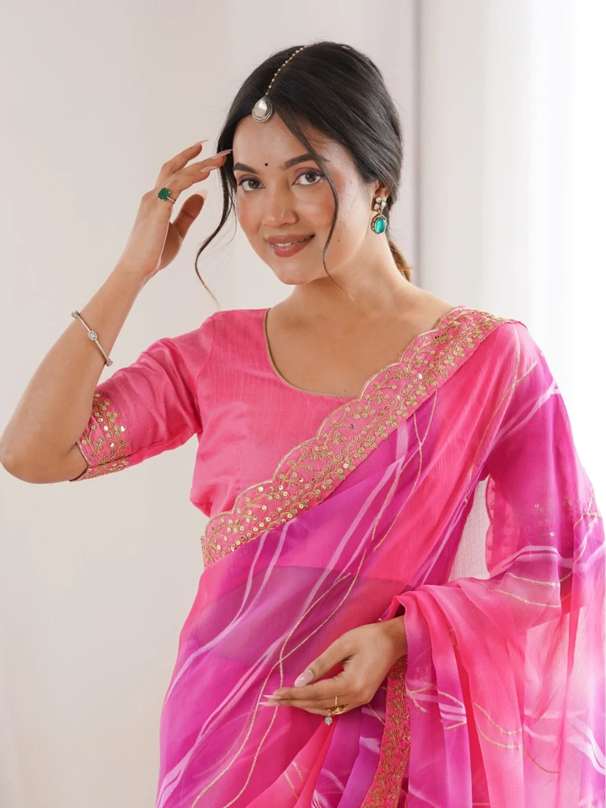 Tarani festive pink saree in georgette chiffon with stylish blouse upper body look