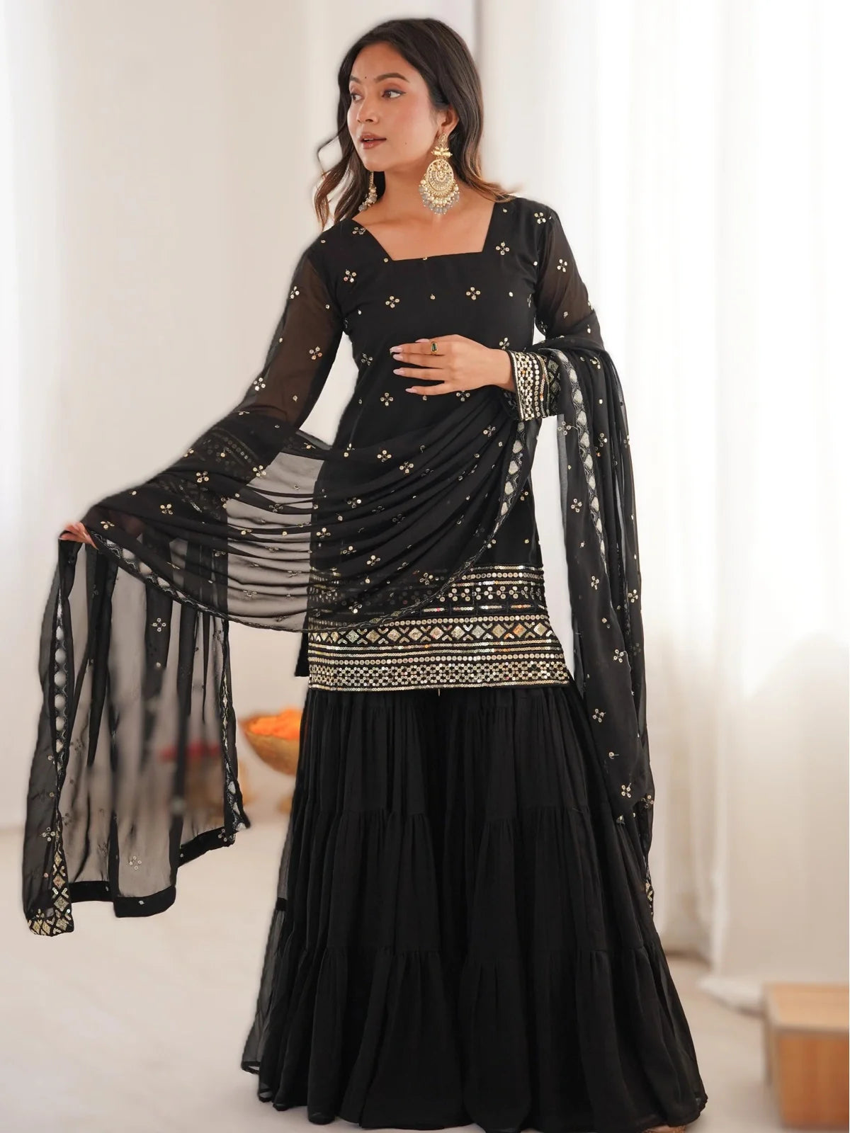 Tarani black georgette dress full front view with golden embroidery and dupatta for festive wear