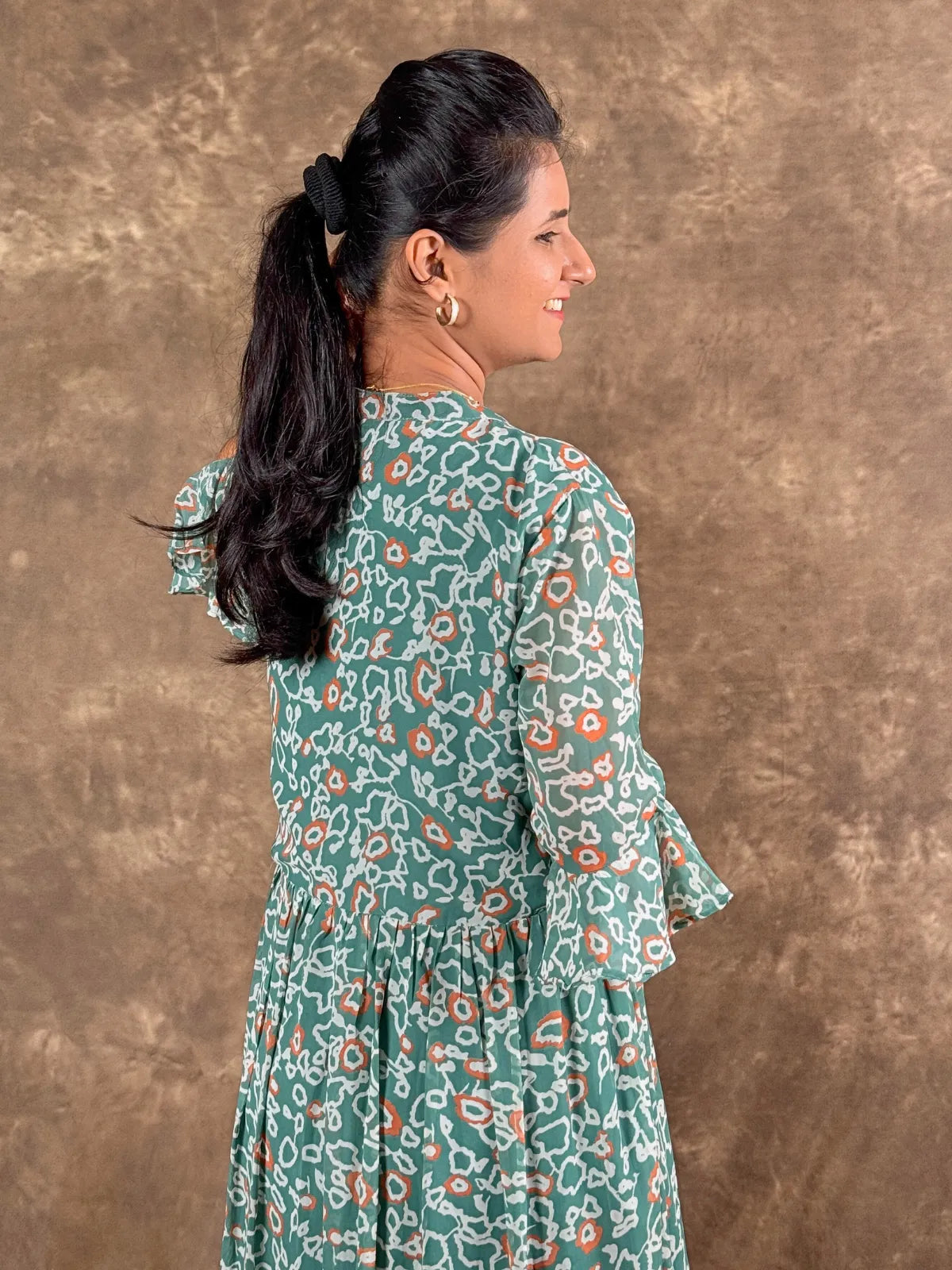 Tarani stylish green georgette midi dress back view with gathered pleats and comfort fit