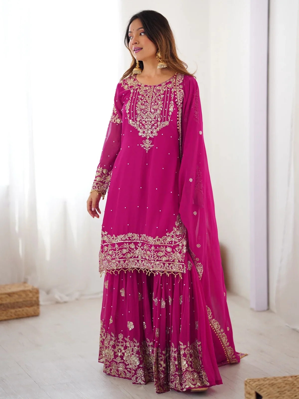 Tarani premium magenta georgette dress full view with golden embroidery and sharara