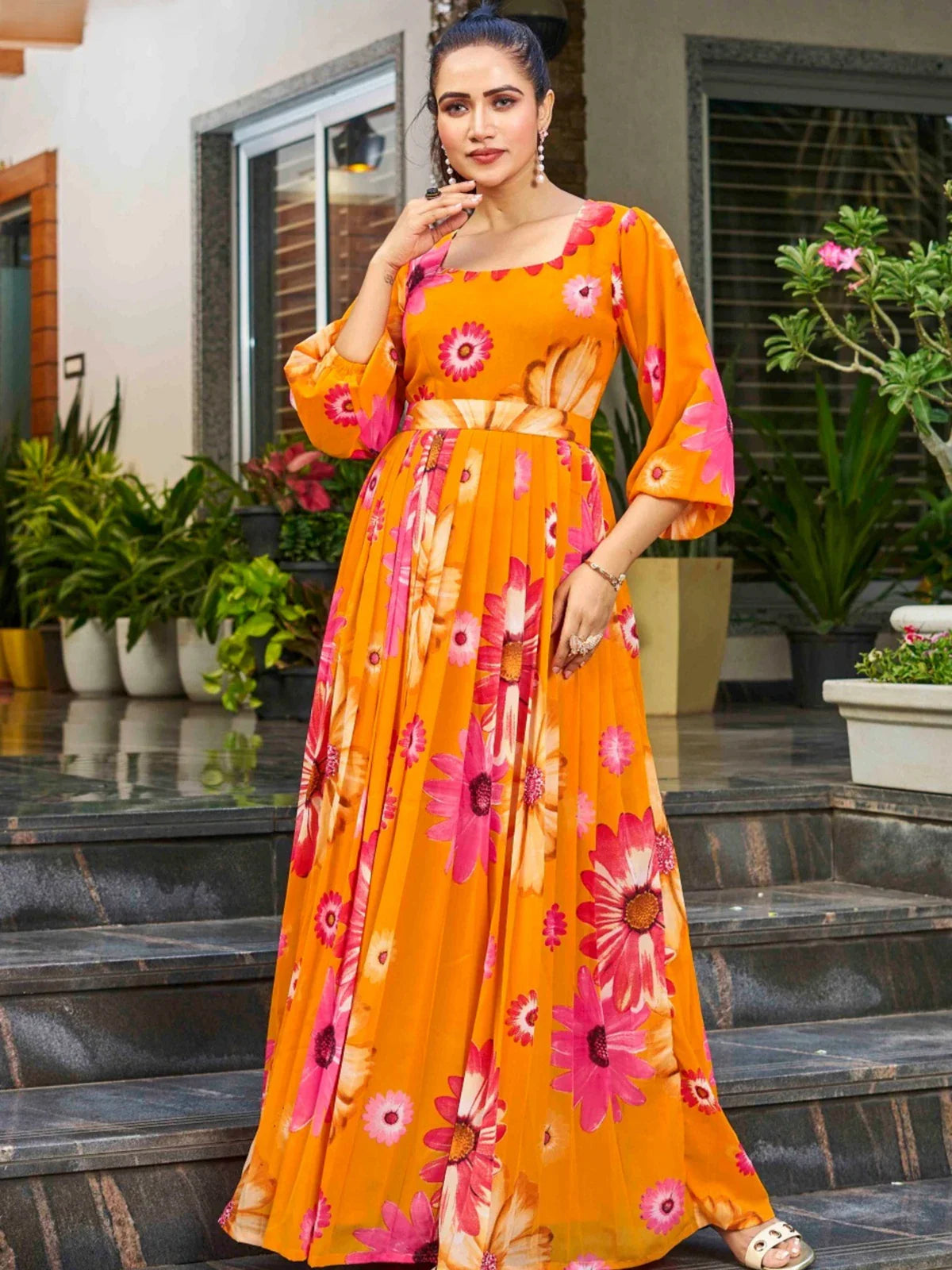 Tarani orange georgette dress with floral print in full view worn by model