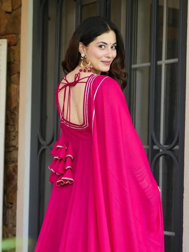Tarani designer pink georgette dress back view with tie-up and gota detailing