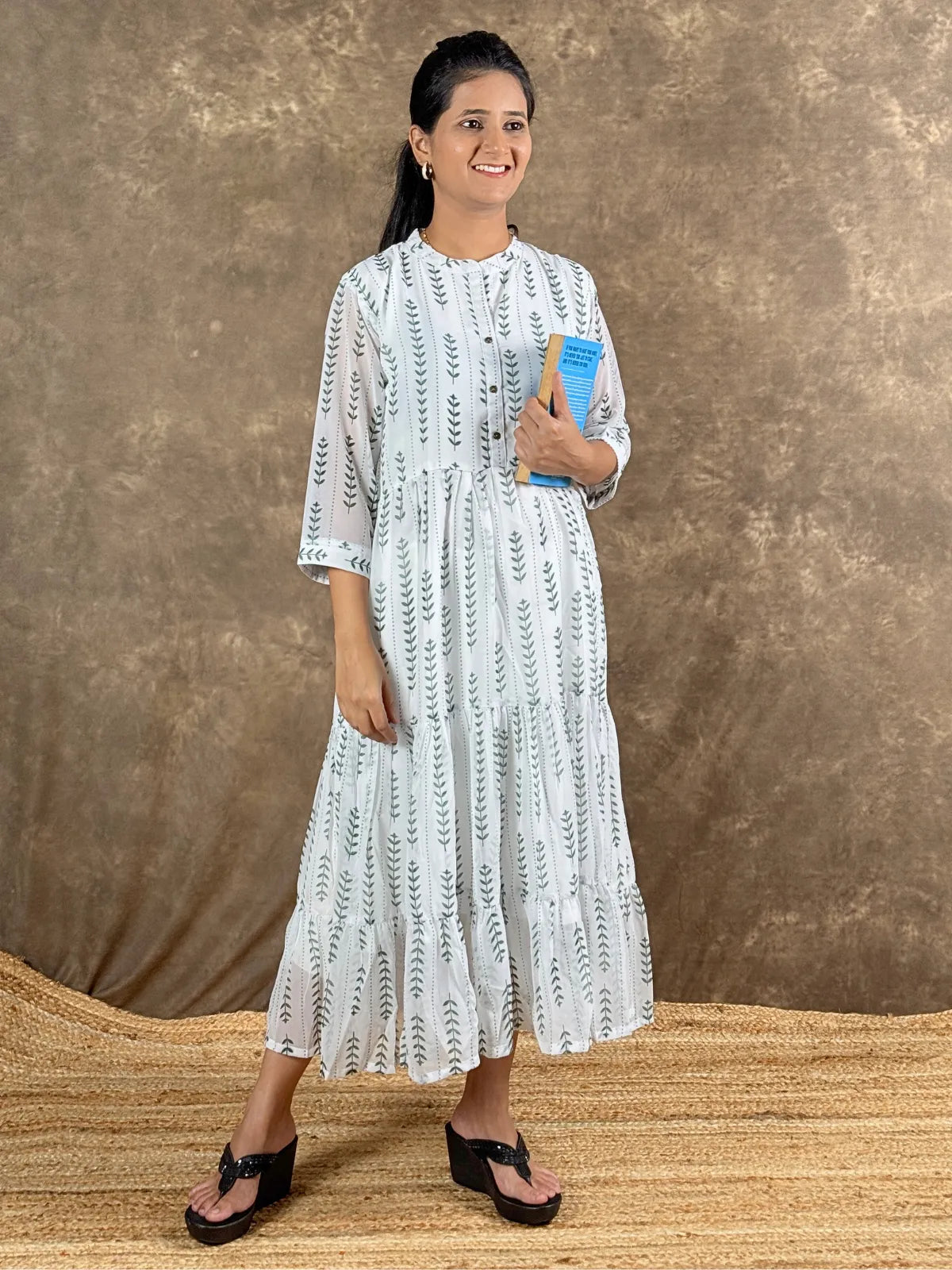 Tarani white georgette midi dress front view styled with casual look