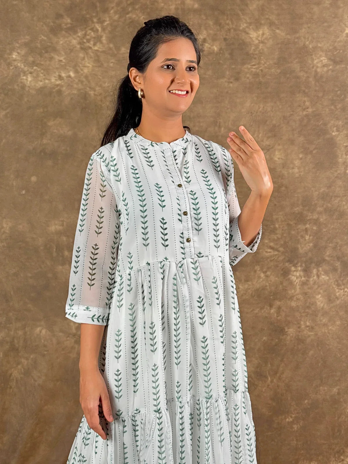 Tarani white georgette midi dress upper body closeup highlighting neckline and buttons