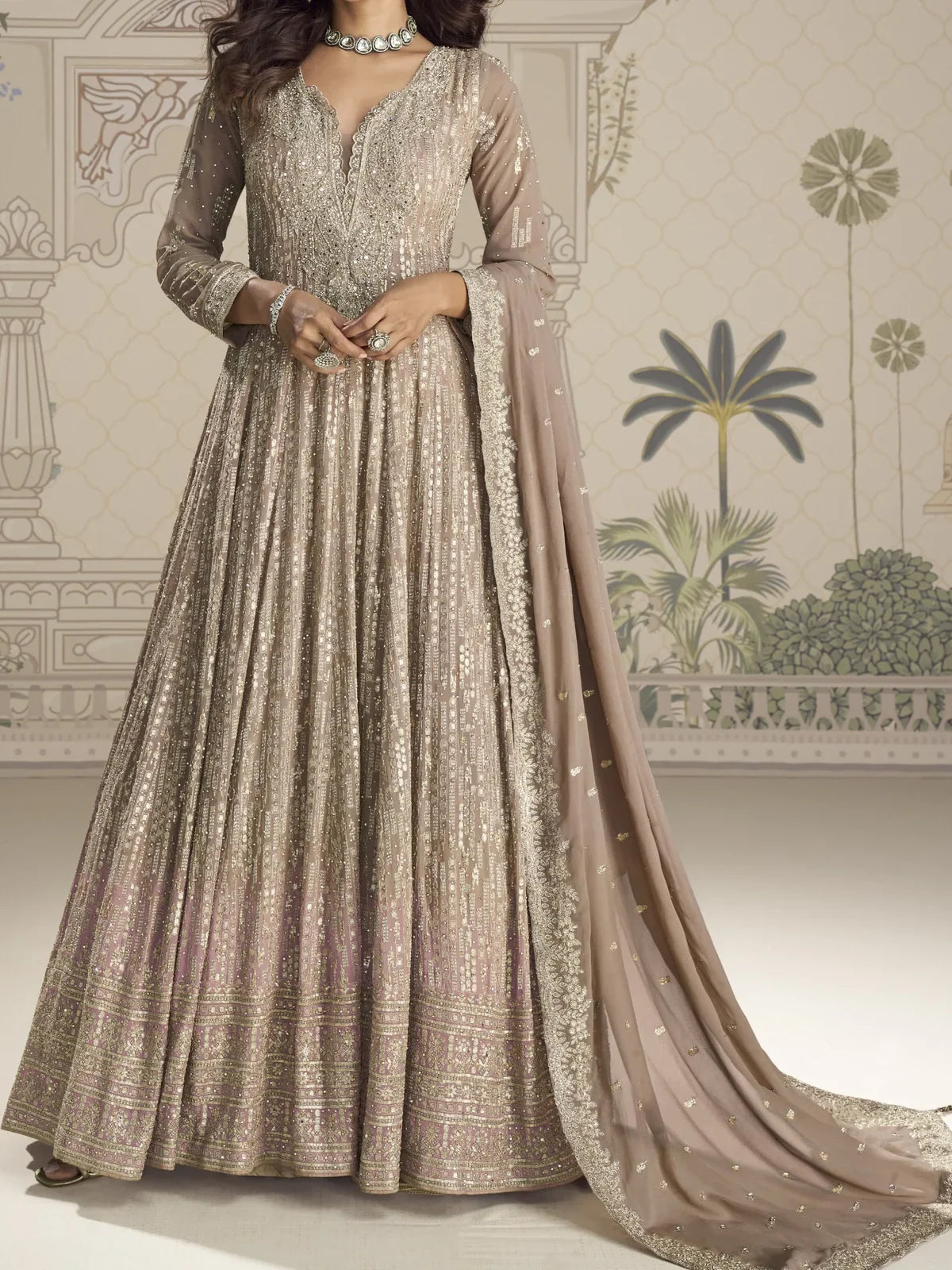 Tarani beige heavy embroidered georgette gown front design with dupatta drape