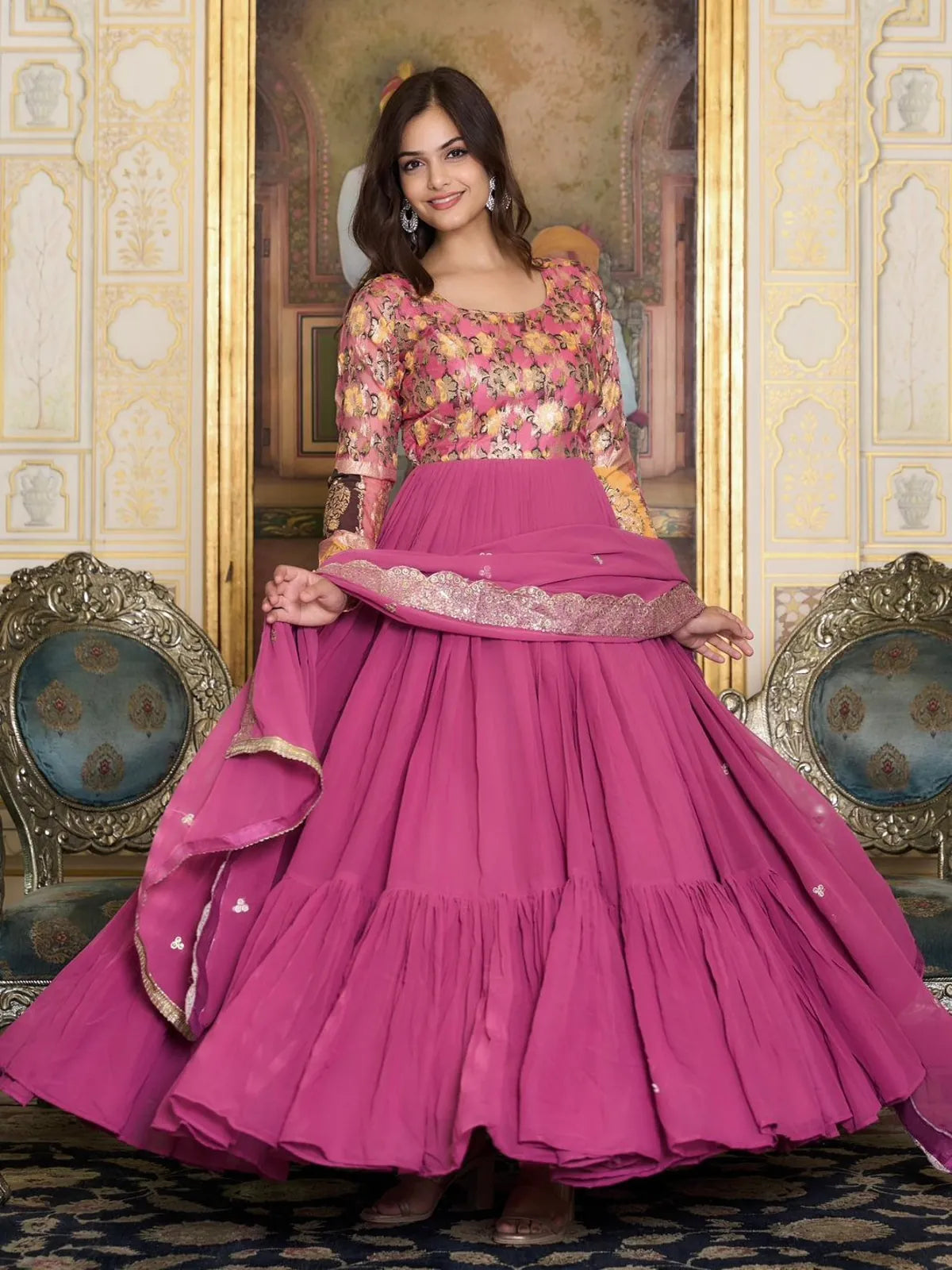 Tarani pink georgette gown front view featuring heavy flare and embroidered dupatta
