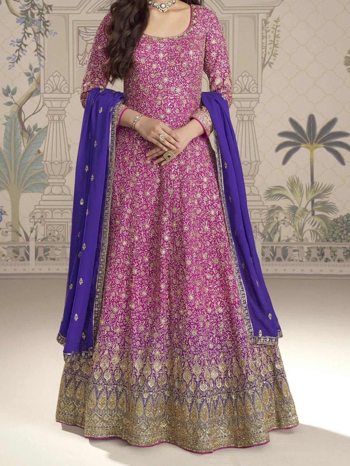 Tarani pink georgette gown closeup view highlighting rich embroidery and border details