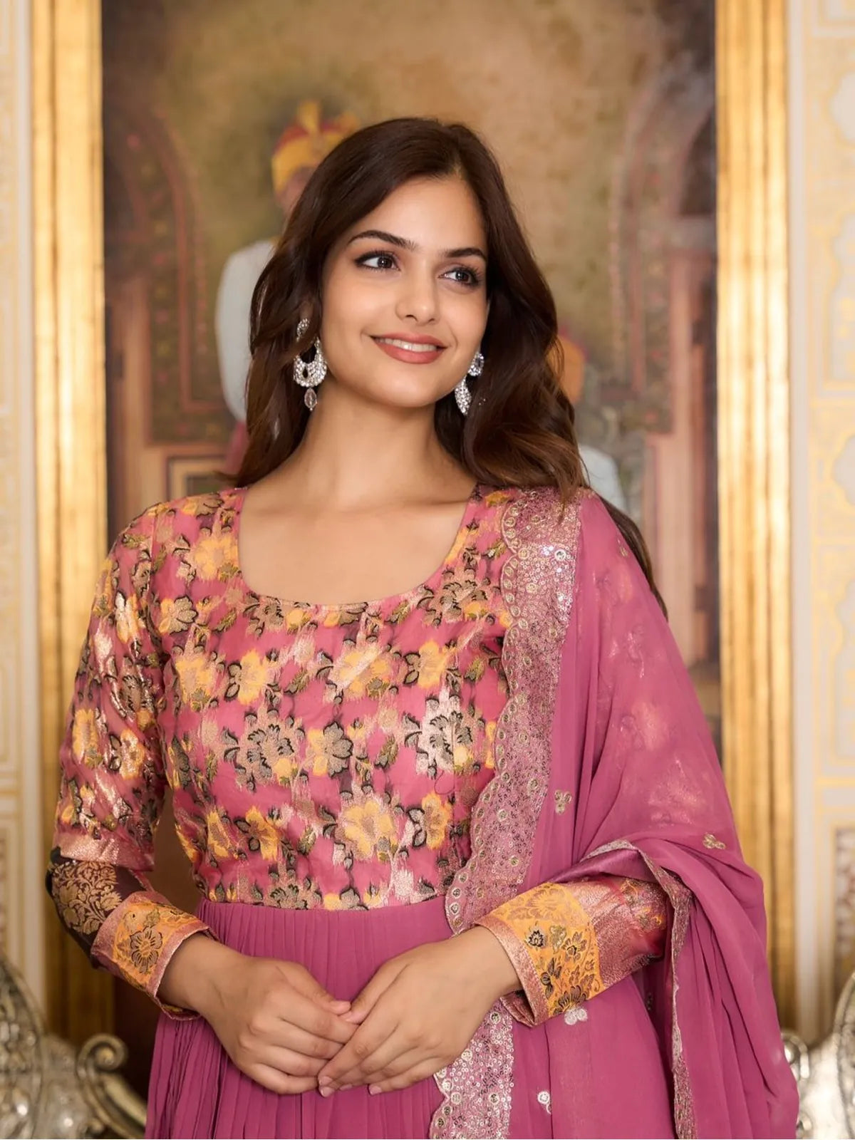 Tarani premium pink georgette gown upper body showcasing floral blouse and zari cuff