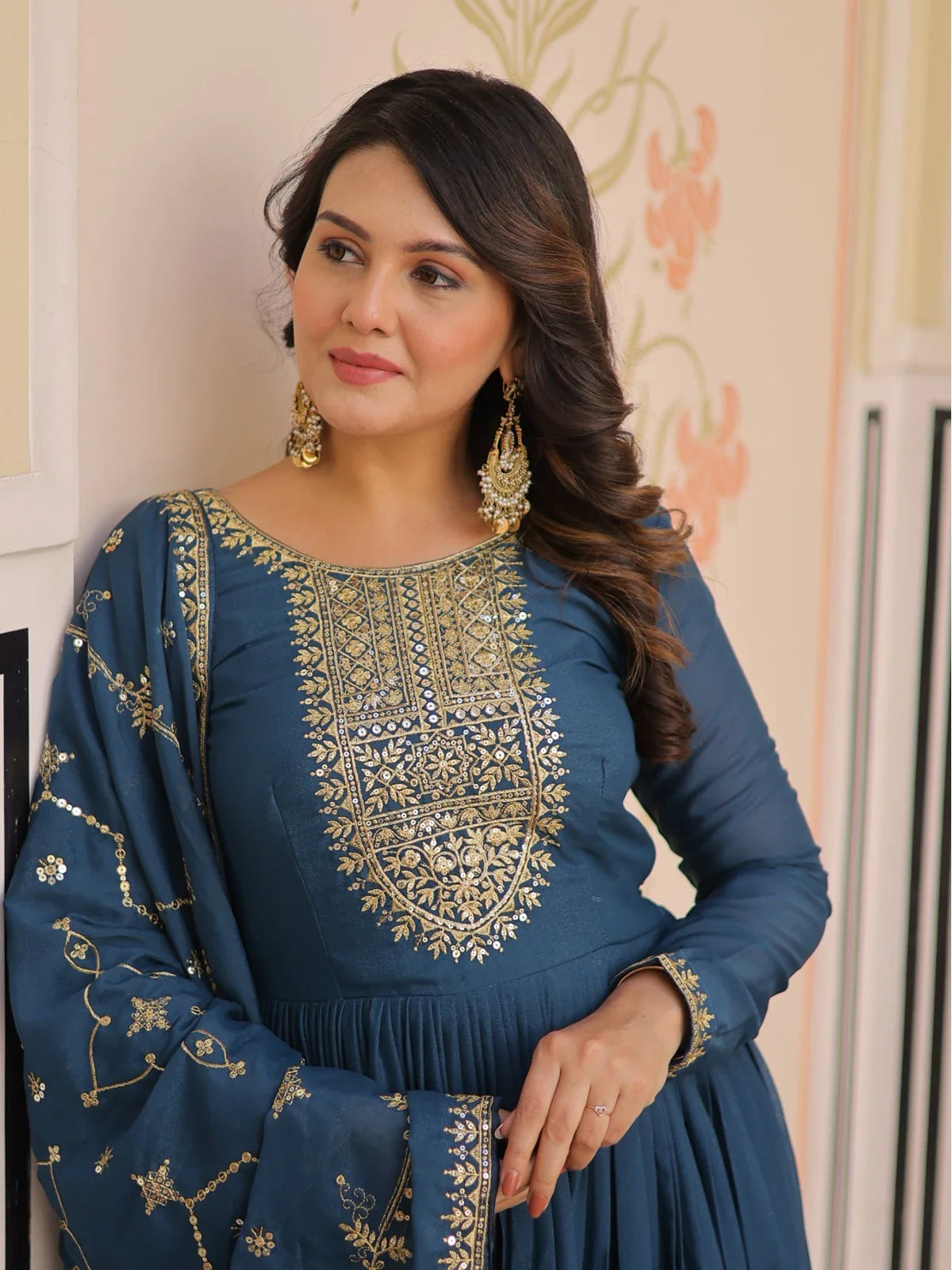 Tarani premium teal georgette gown upper body view with intricate zari embroidery