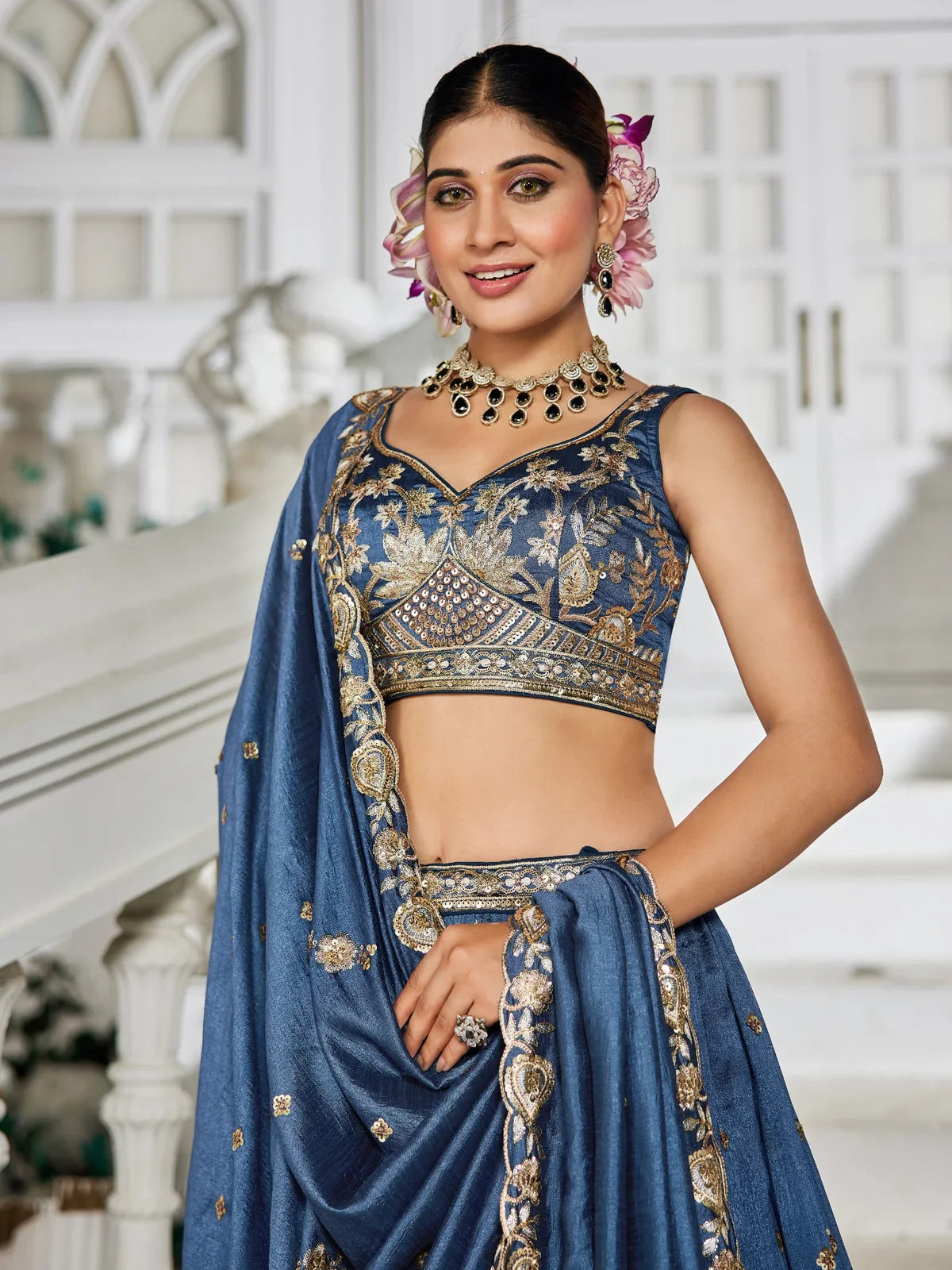 Tarani blue georgette lehenga with embroidered blouse upper body view