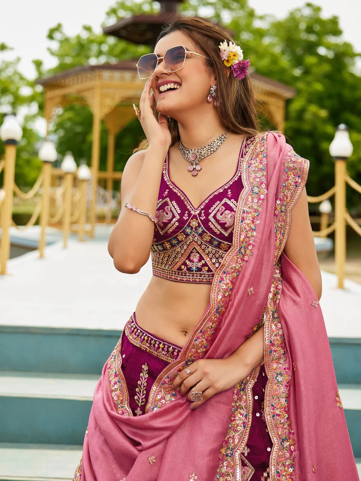 Tarani magenta georgette lehenga with embroidered blouse and dupatta upper body view