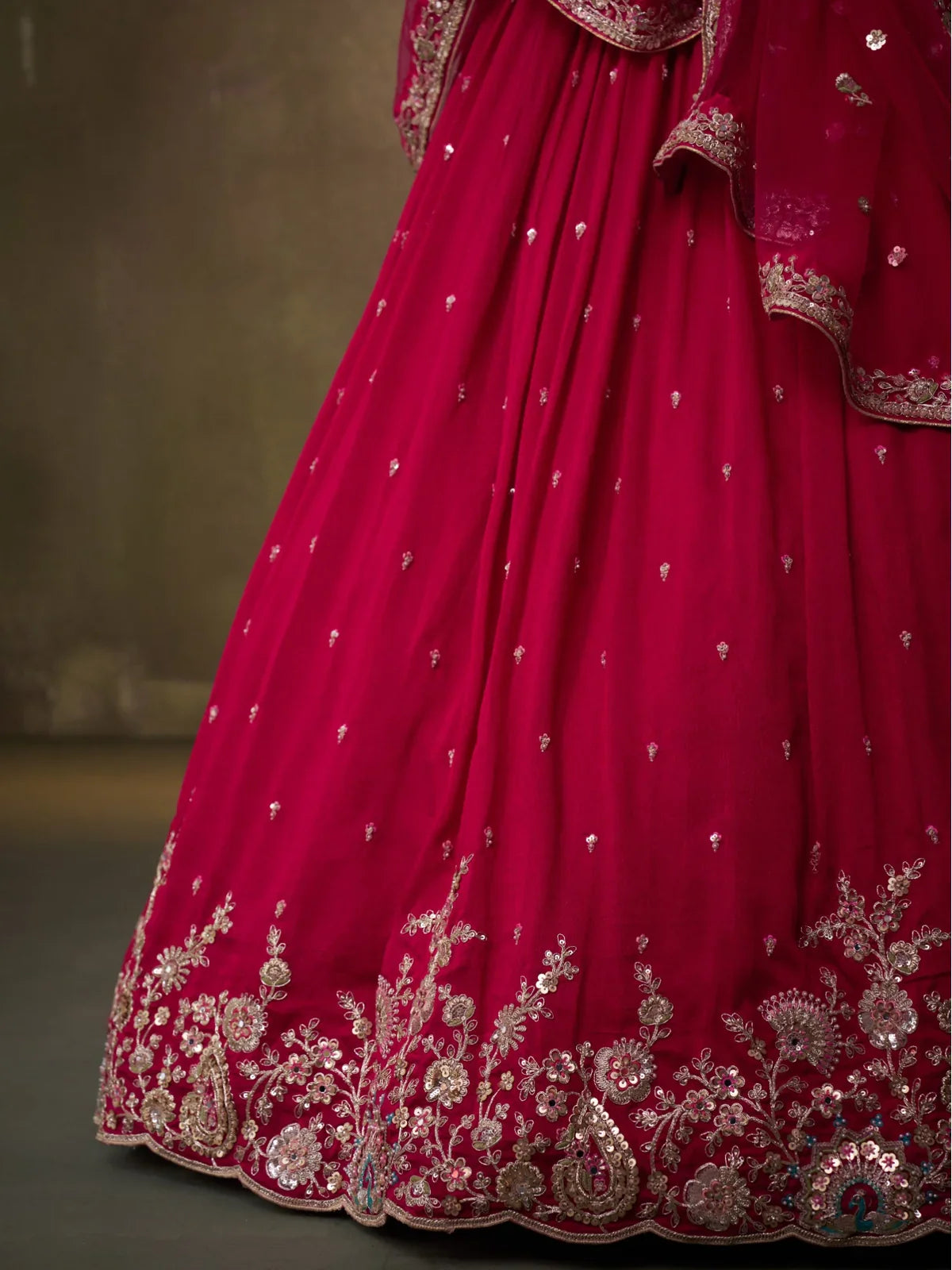 Tarani pink lehenga bottom embroidery closeup showing floral sequin and thread details