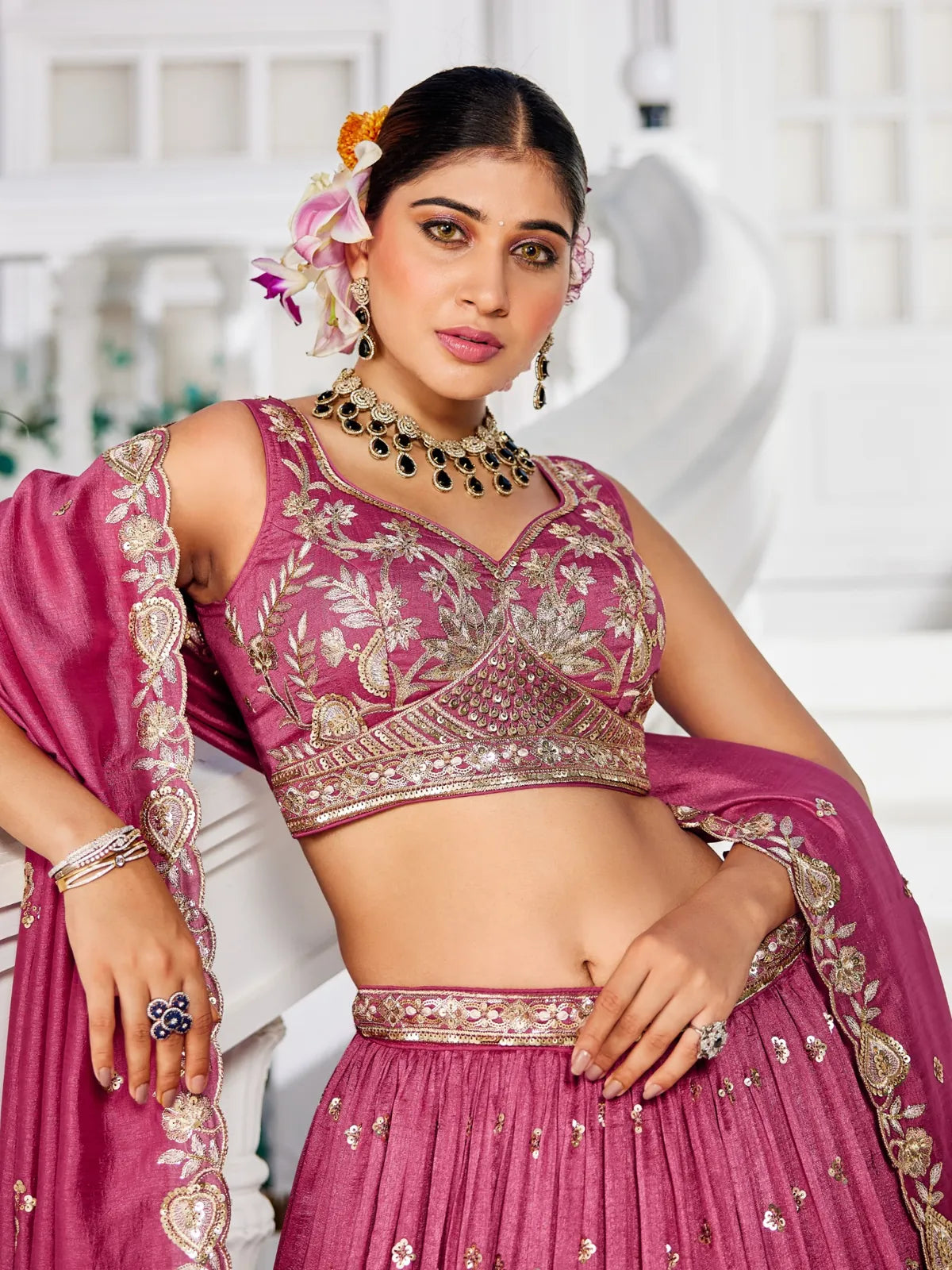 Tarani pink georgette lehenga close-up of blouse and upper body embroidery design