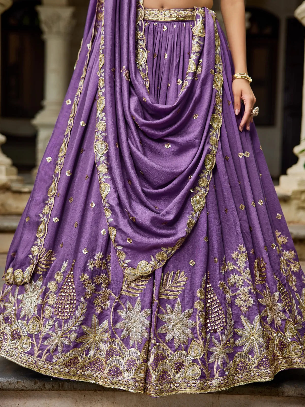 Tarani purple georgette lehenga front view with sequin embroidery details