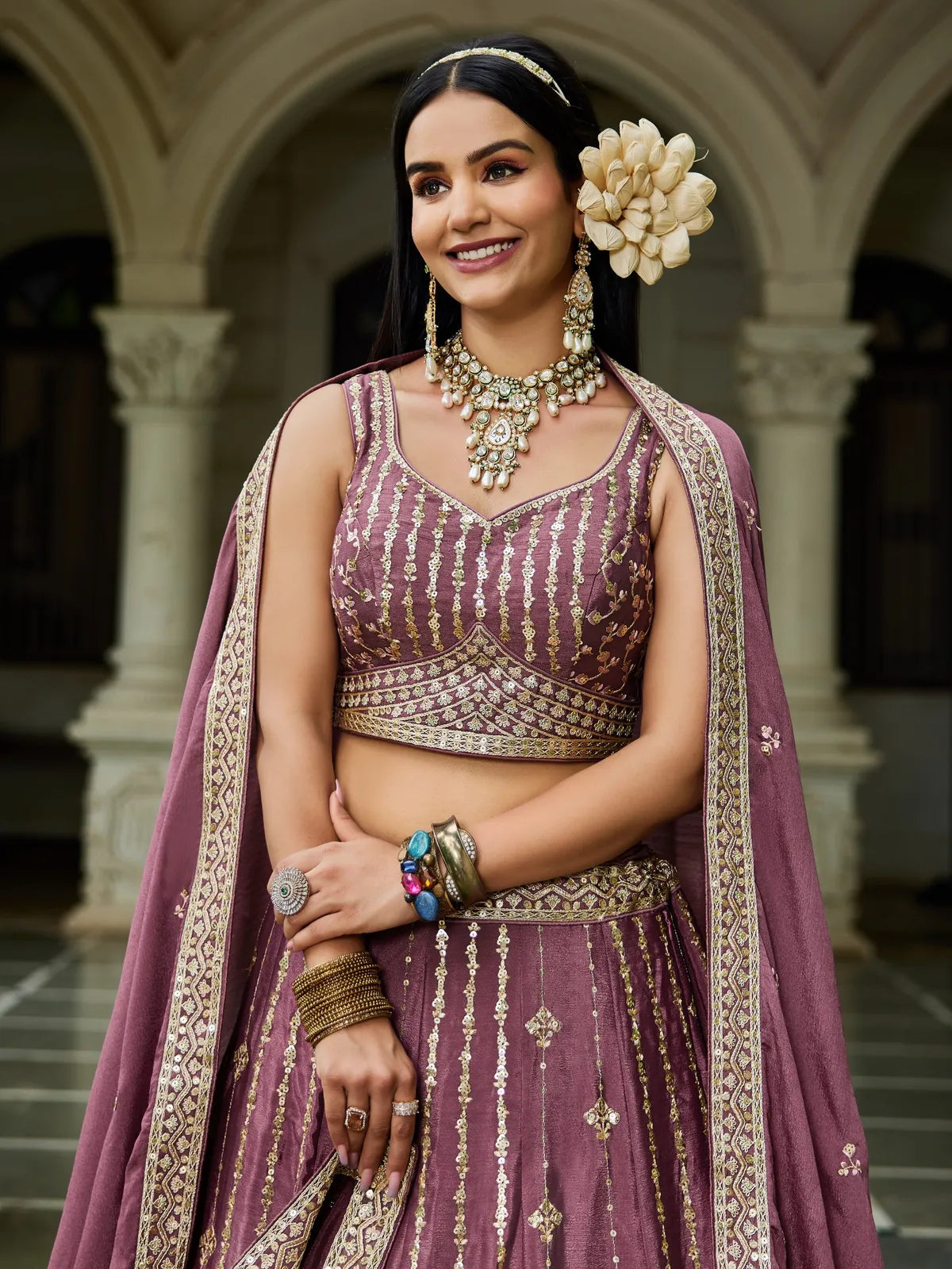 Tarani violet georgette lehenga upper body view with blouse and jewelry styling