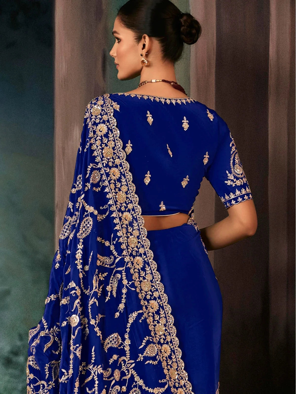 Tarani priyamvadika Blue Georgette saree drape detail view for festive party and wedding wear