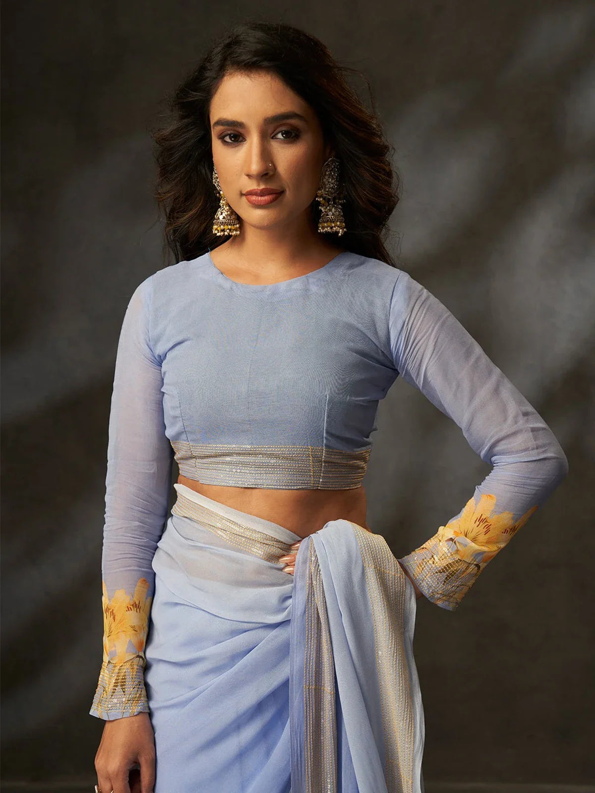 Tarani premium blue georgette saree full front view with yellow floral design