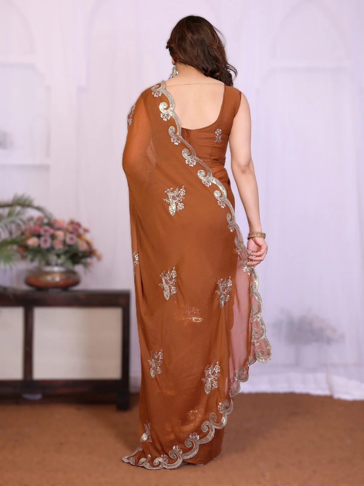 Tarani shuchi Brown Georgette saree drape detail view for festive party and wedding wear