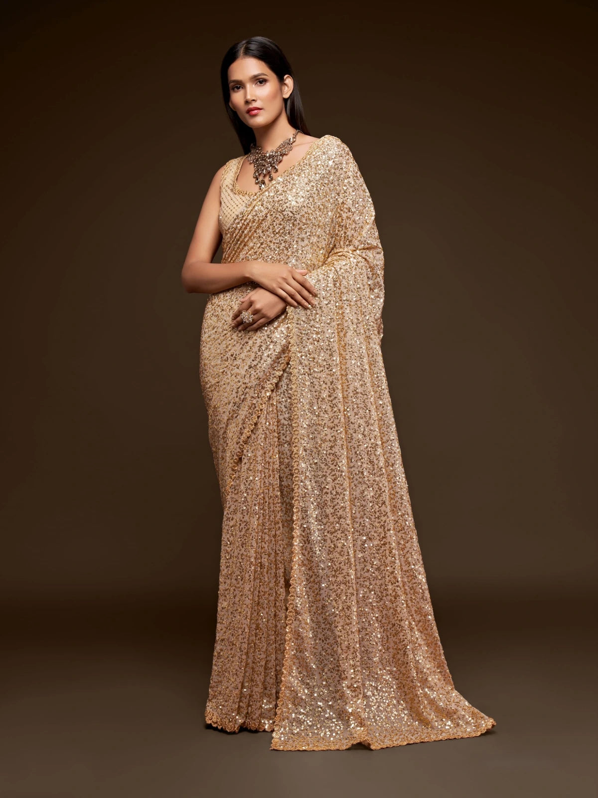 Tarani golden georgette saree full view with thread and sequins embroidery for festive party wear