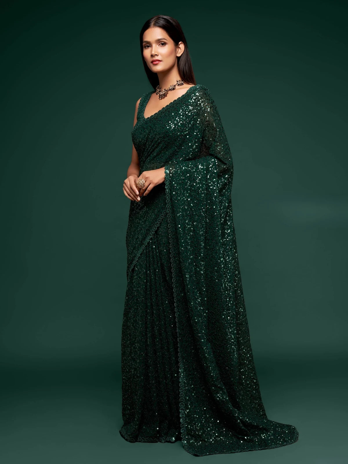 Tarani green georgette sequins embroidered saree full view for party and festive wear