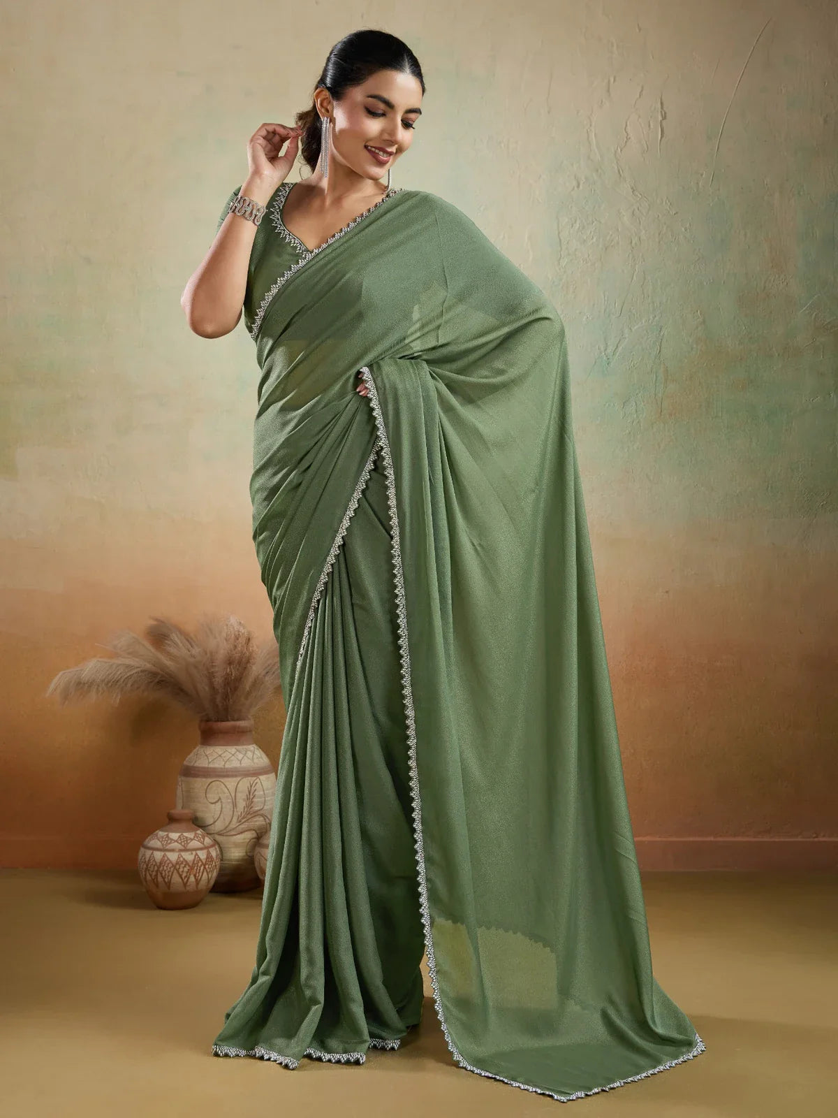 Tarani green georgette party saree with lace border full view