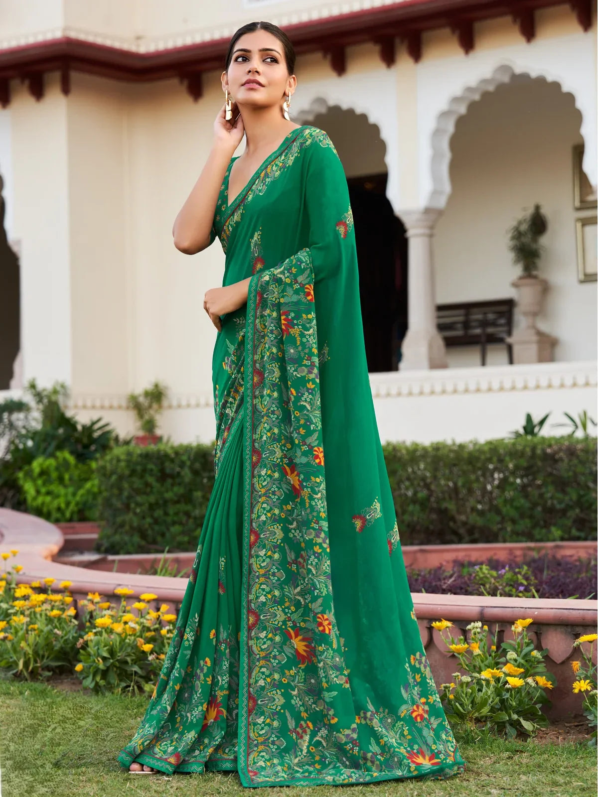 Tarani green georgette saree full view with floral print and patch border work