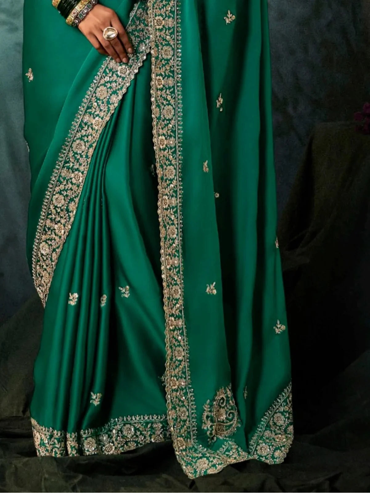 Tarani avanita Green Georgette saree close up view for festive party and wedding wear
