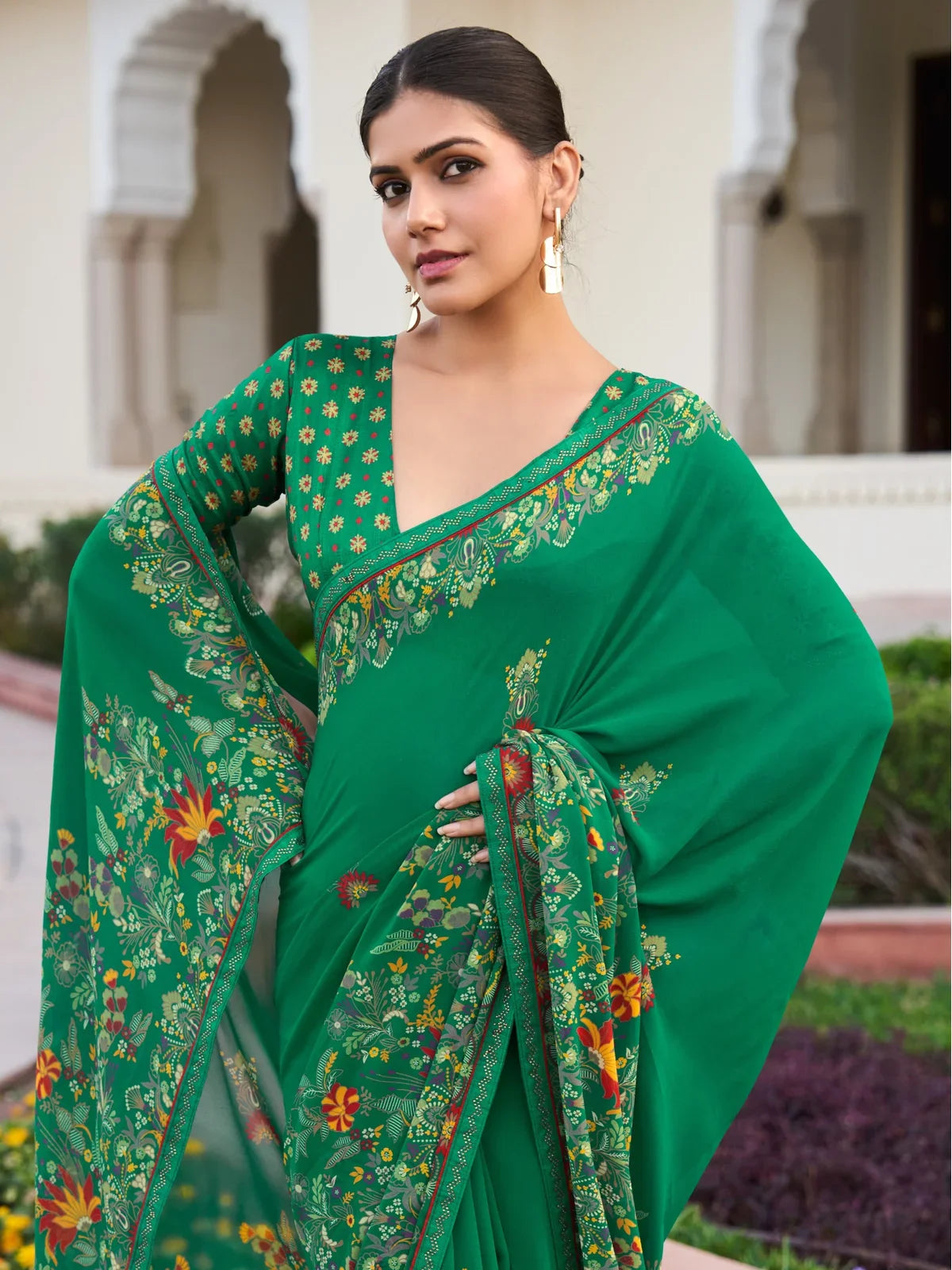 Tarani green georgette saree upper body view with floral pallu and blouse