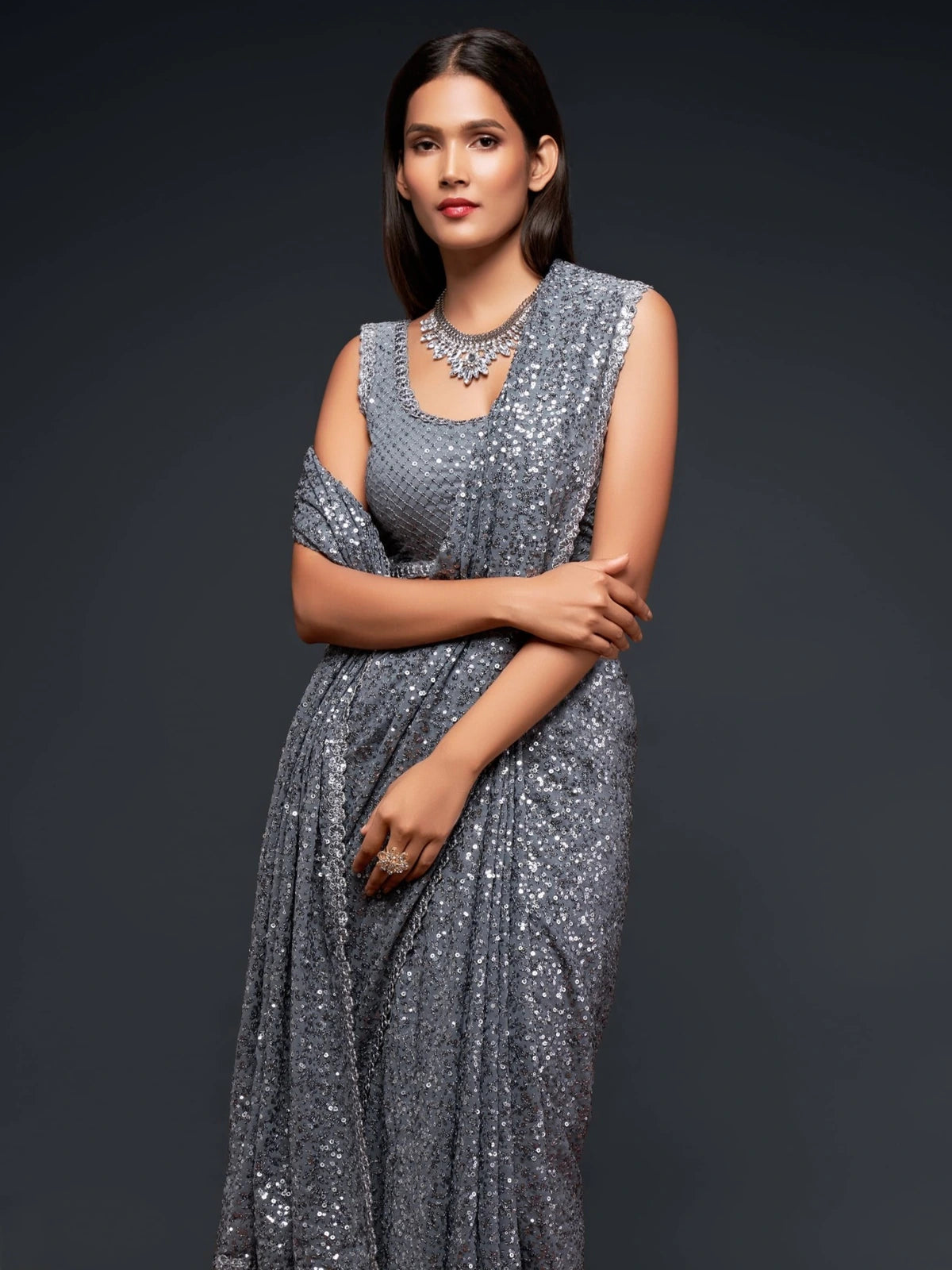 Tarani elegant grey georgette saree front pose with detailed sequins work