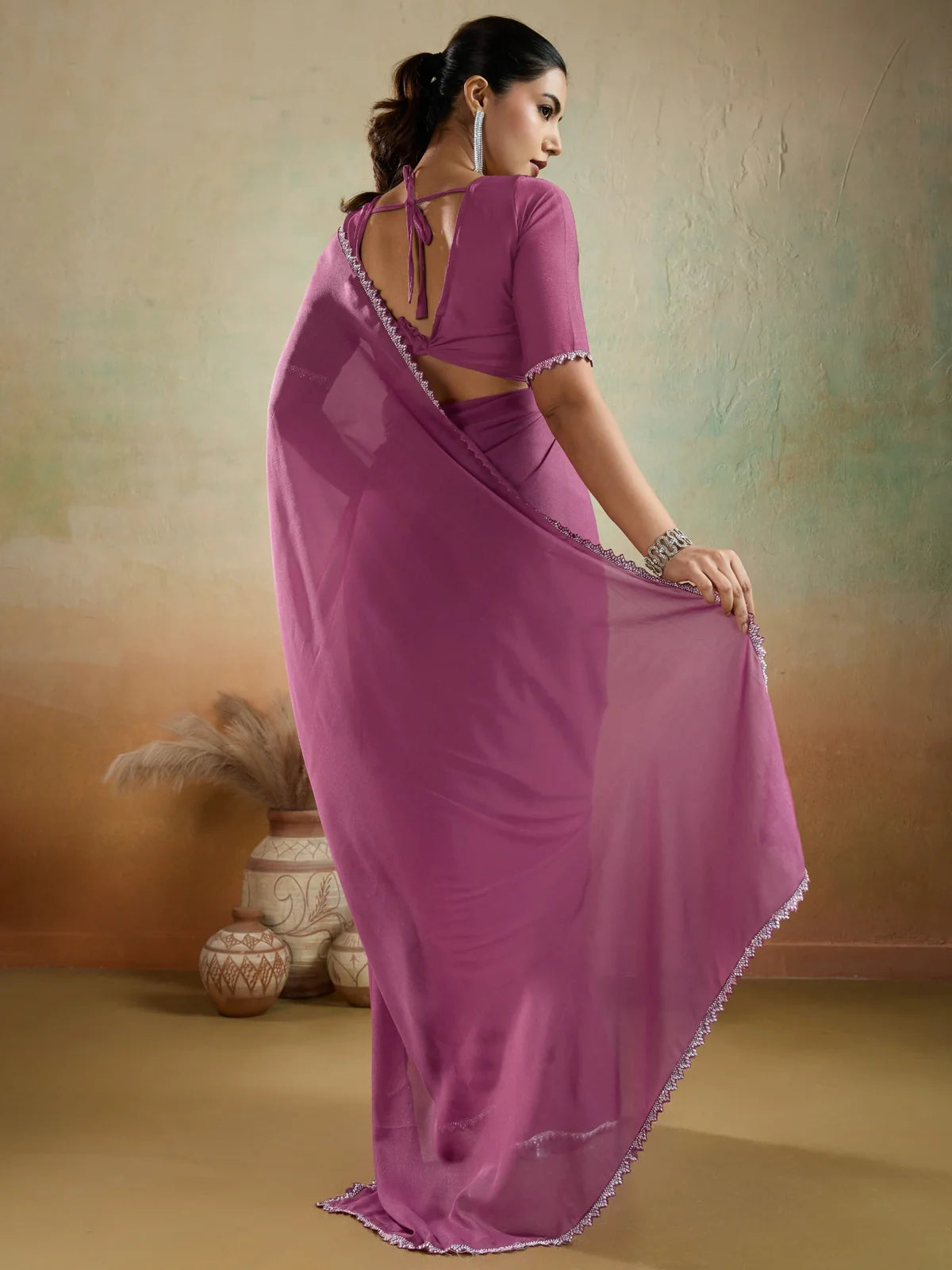 Tarani magenta georgette saree back view showing elegant blouse design