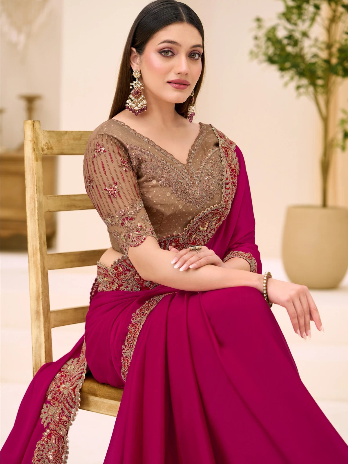 Tarani Kshanika magenta party wear saree side view with detailed zari embroidery blouse