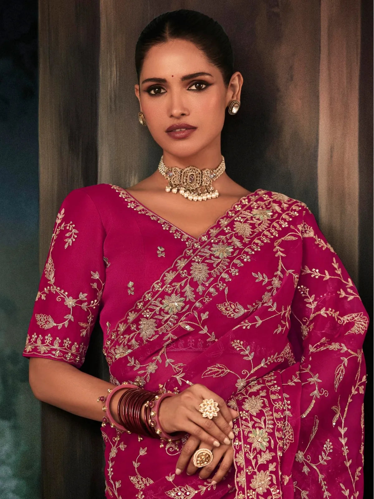 Tarani magenta georgette saree upper-body view with embroidered border and matching blouse