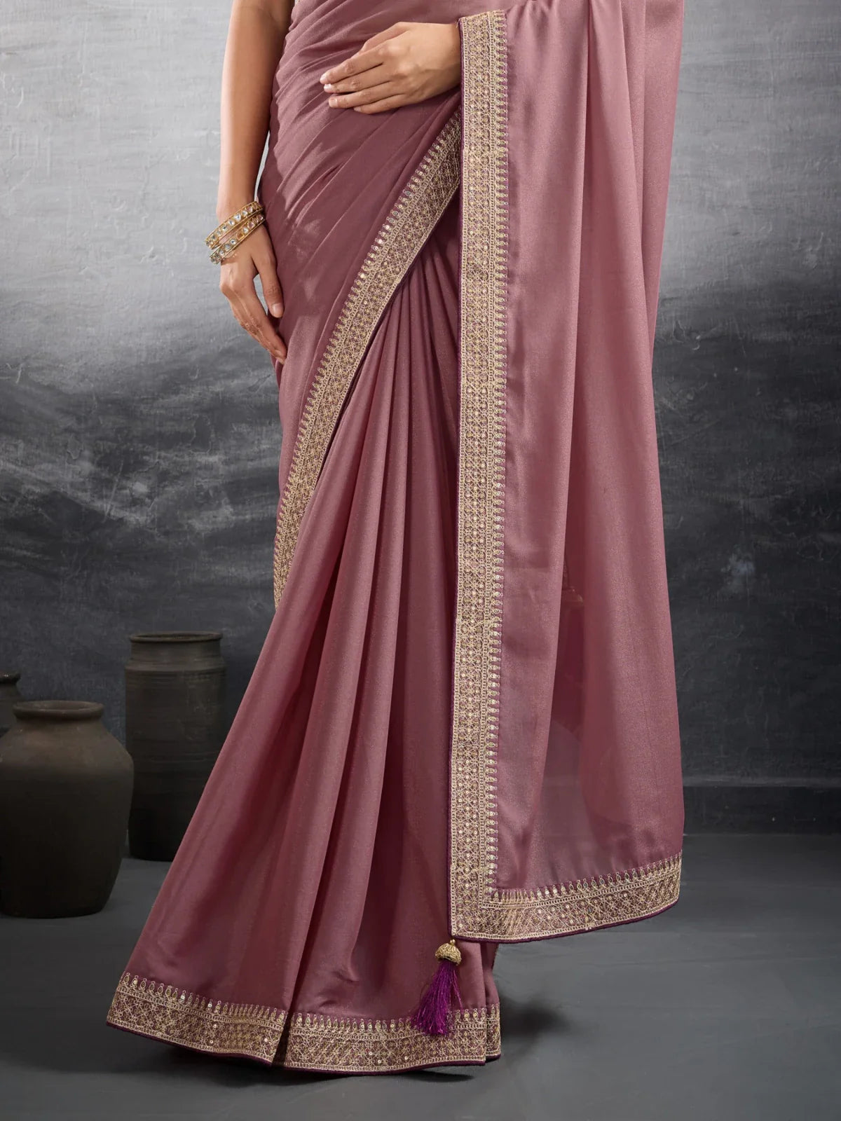 Tarani mauve georgette saree pallu view showing elegant border detailing