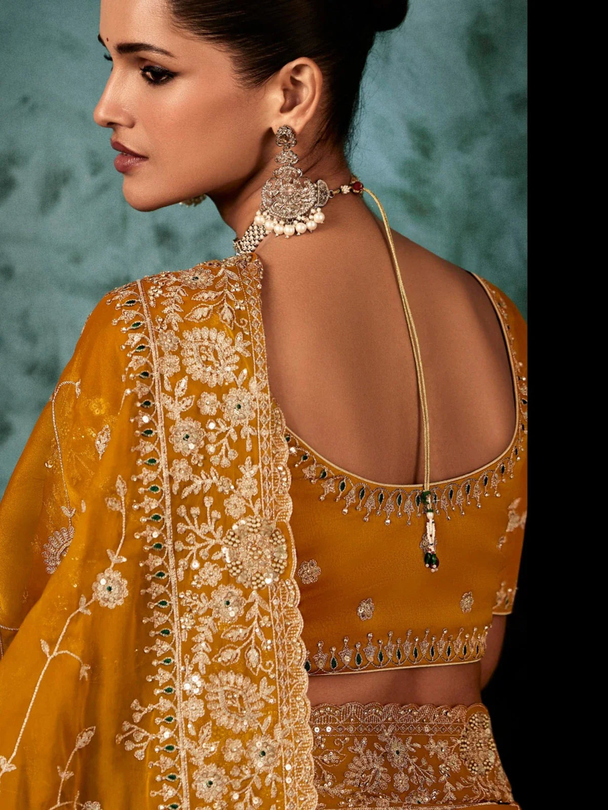 Tarani anjika Mustard Georgette saree drape detail view for festive party and wedding wear