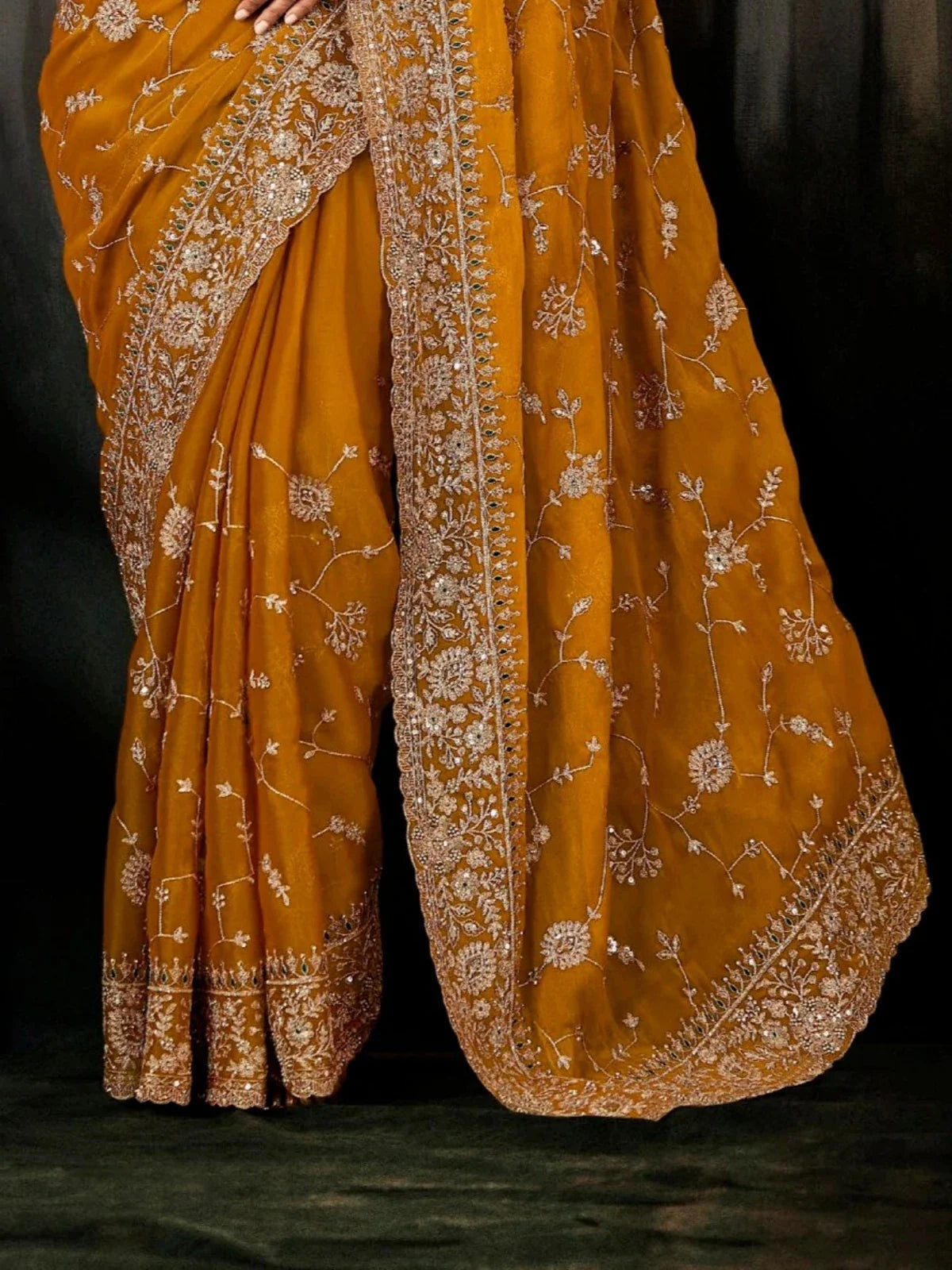 Tarani anjika Mustard Georgette saree close up view for festive party and wedding wear