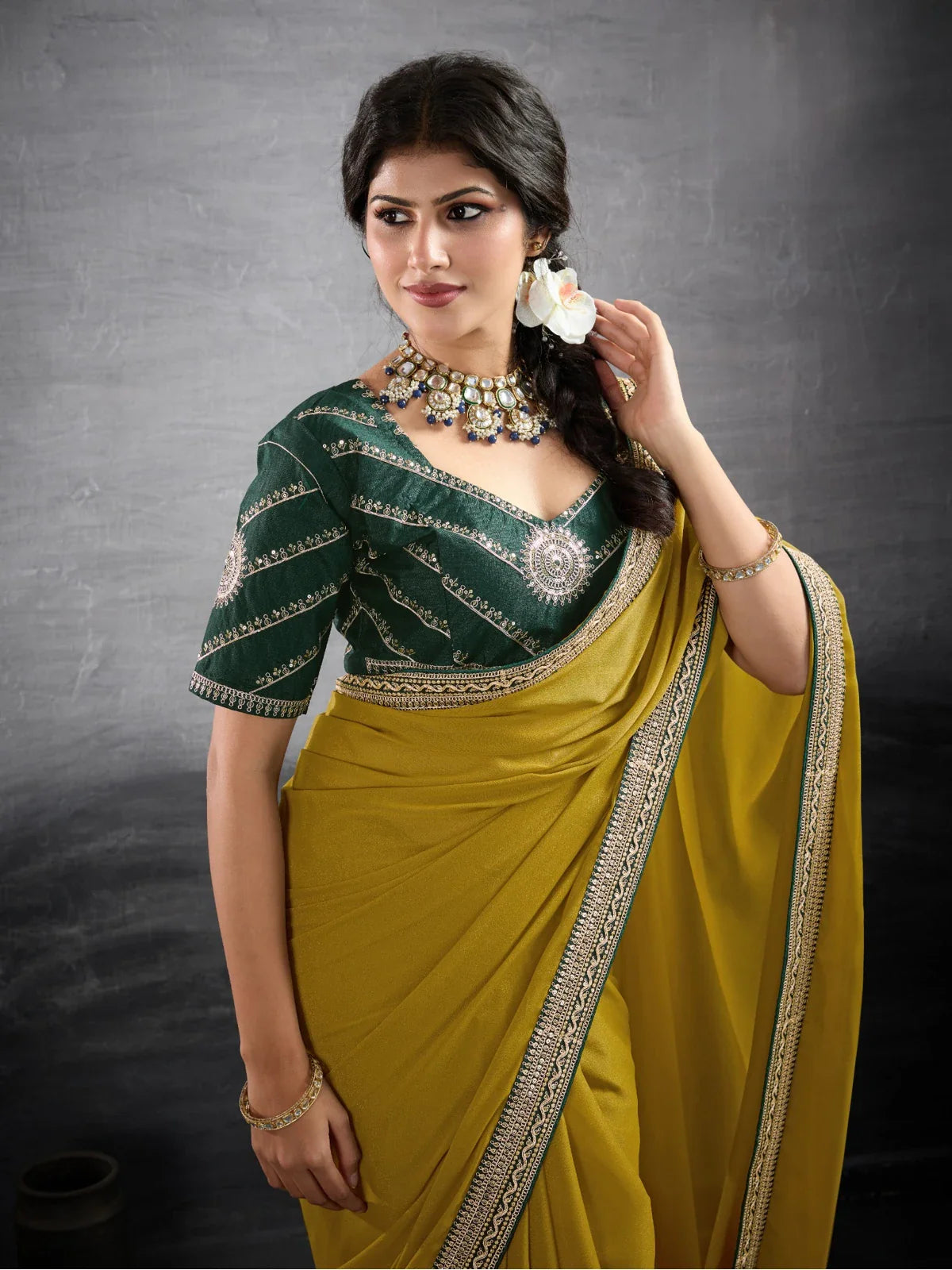 Tarani mustard georgette saree upper body view with embroidered blouse for festive and party wear