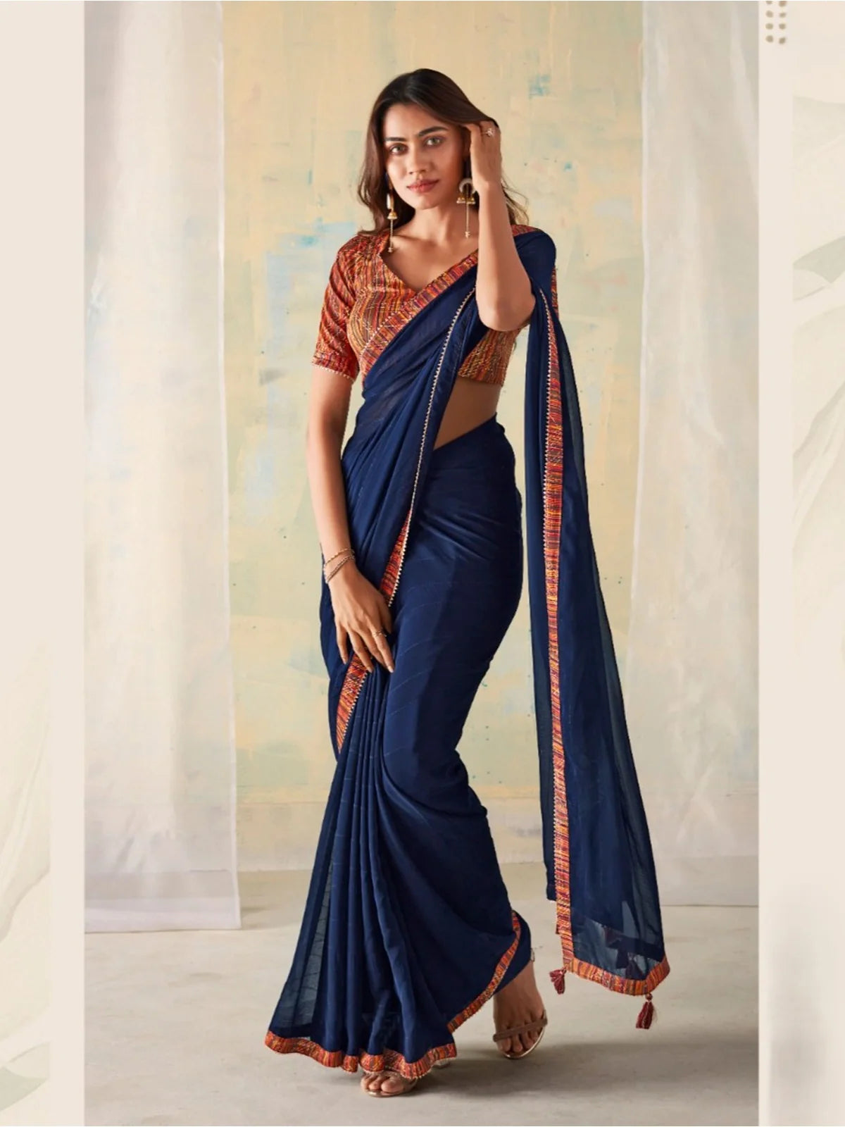 Tarani premium navy blue georgette saree full view with printed blouse for festive and wedding occasions